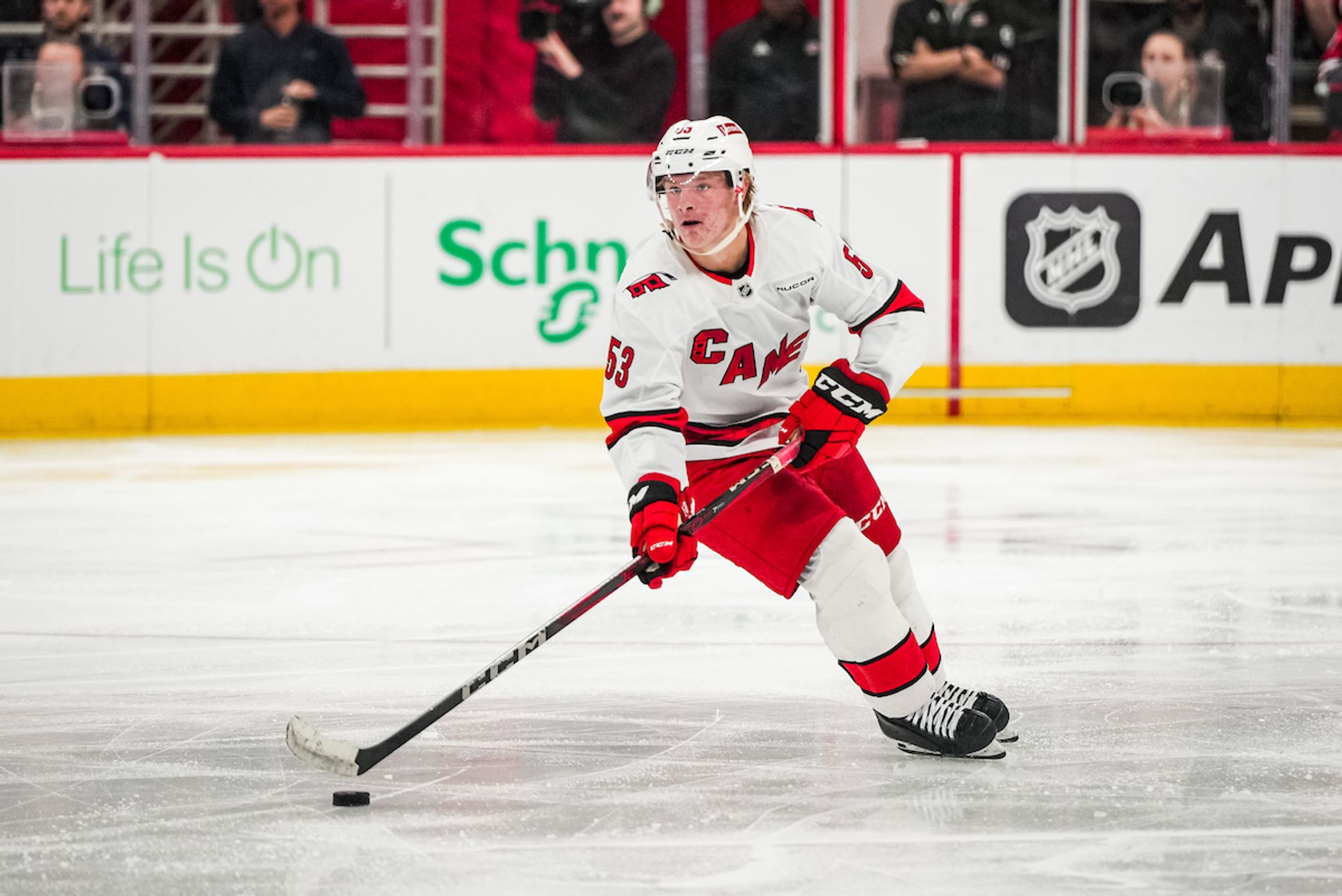 Jackson Blake skates with the puck during a preseason game at Lenovo Center.