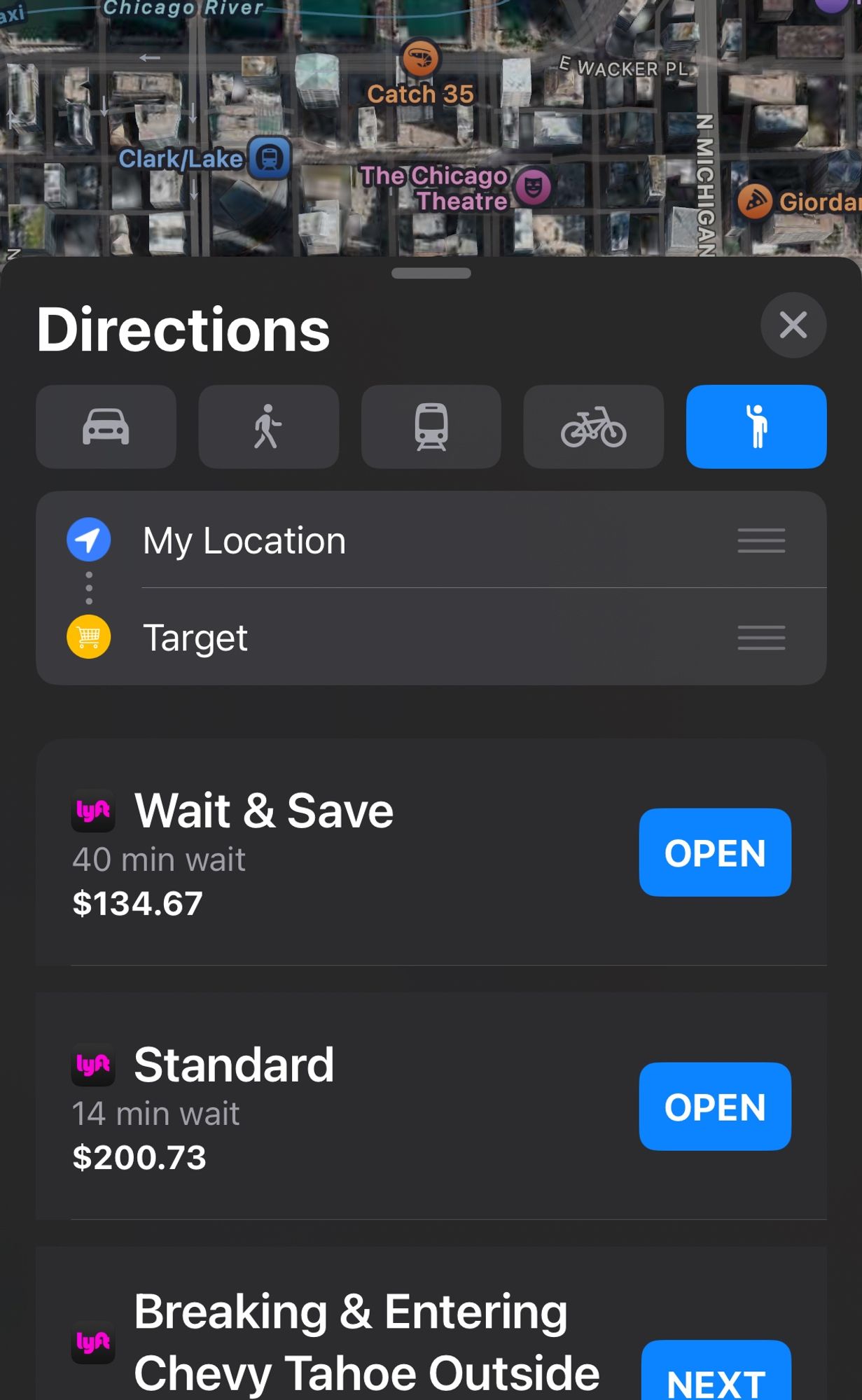 A screenshot of Apple Maps using ridesharing directions. Three options are available from Lyft. The first, "Wait & Save", has a 40 minute wait and costs $134.67. The second, "Standard", has a 14 minute wait, but costs $200.73. The last option is titled "Breaking & Entering Chevy Tahoe Outside".