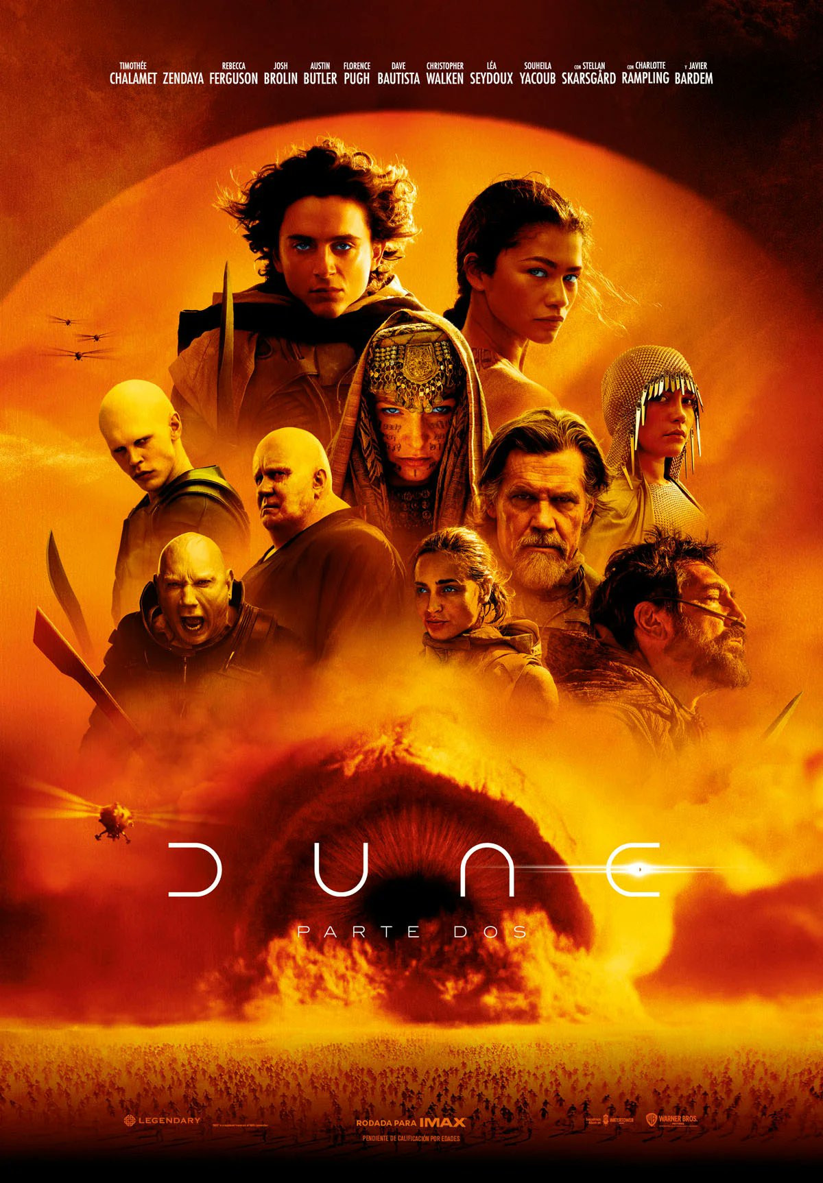 Poster promocional de Dune donde sale el plantel de personajes más importantes y el gusano con un filtro naranja.