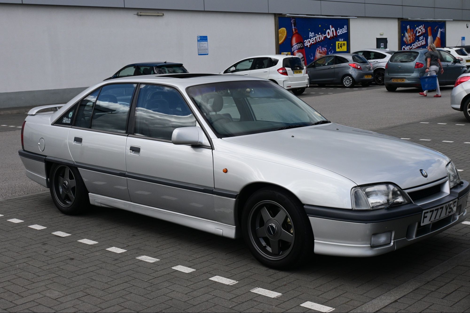 A silver Vauxhall Carlton parked in a LIDL car park. This, apparently, was en-route to the Nurburgring later in July!