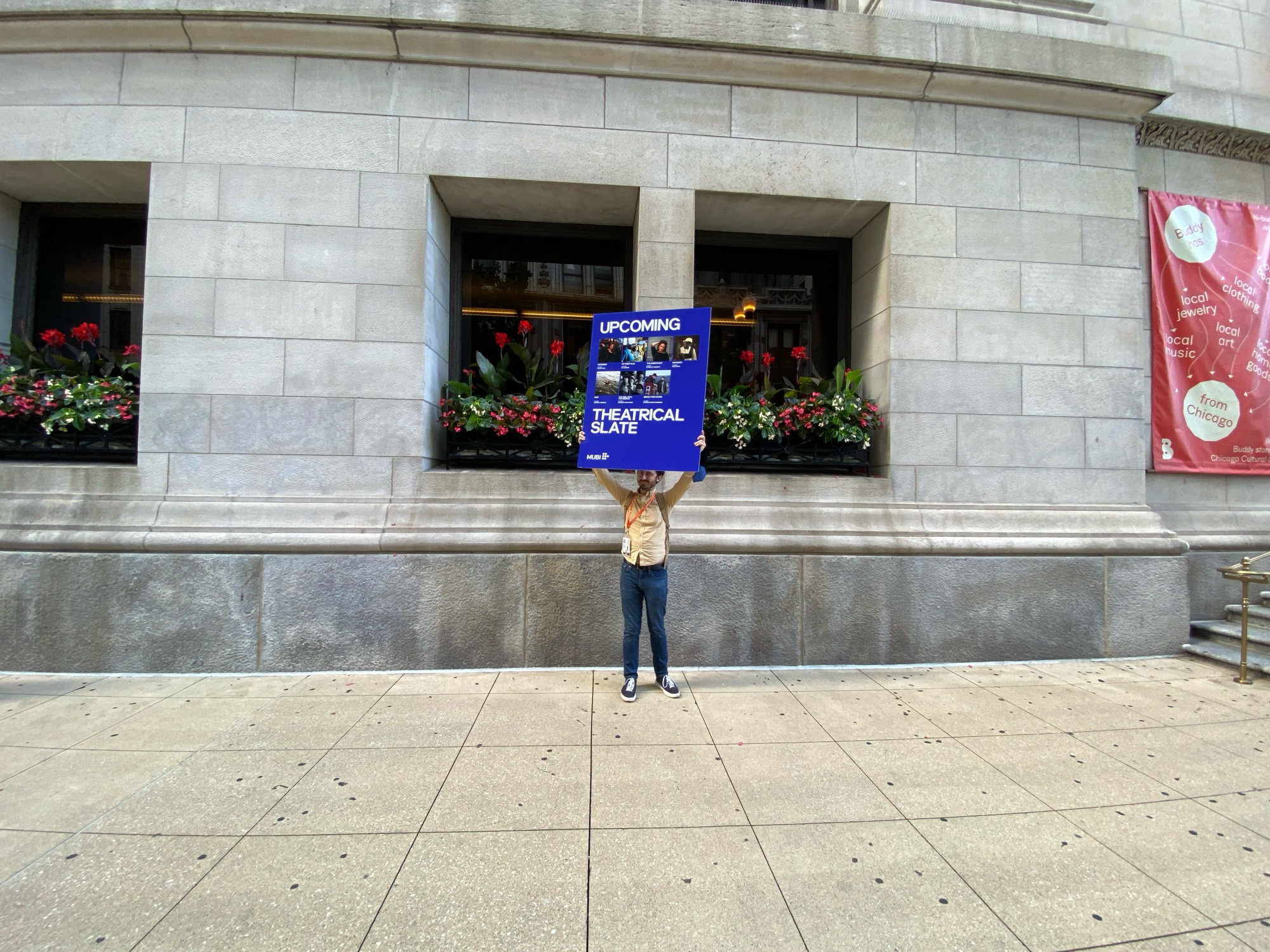 Standing on the streets of Chicago with a foam board advertising MUBI releases