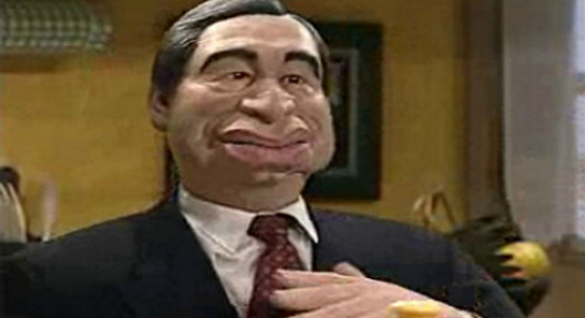 A caricaturized muppet of António Guterres when he was Portugal's Prime Minister from a program called Contra Informação. It was a brilliant satire show but sadly its comedic value was very pertinent to the time it aired in and is only available in Portuguese.