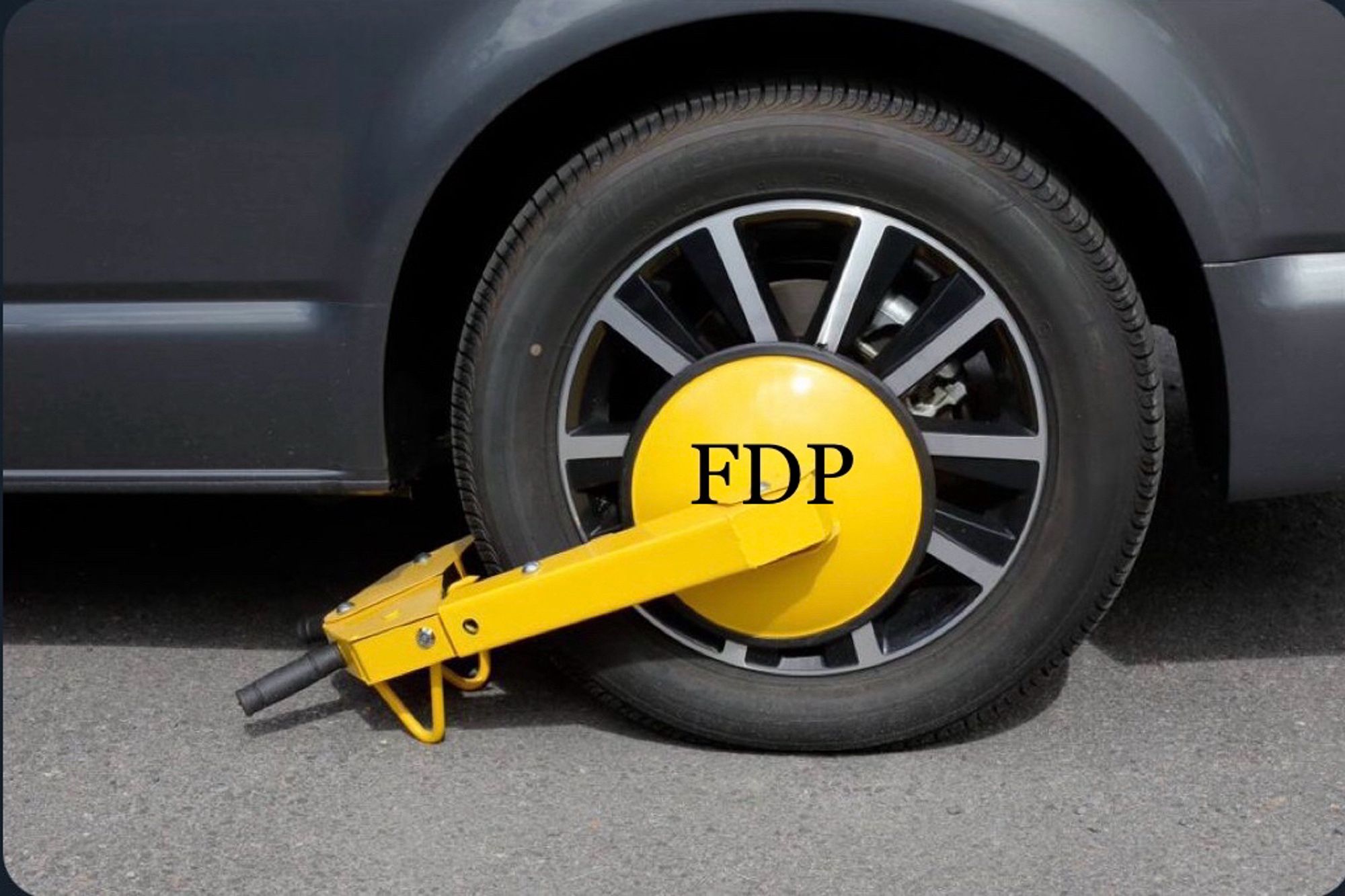 Gelbe Parkkralle mit FDP Logo