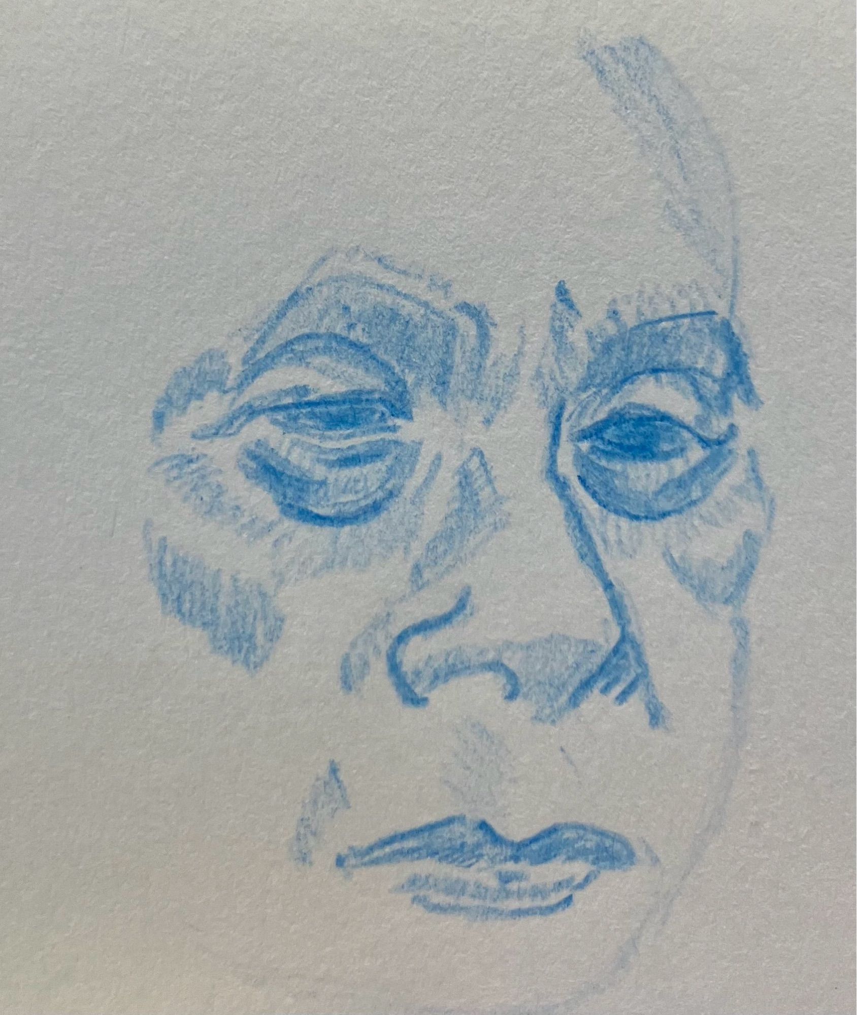 A pencil drawing of a partial face.