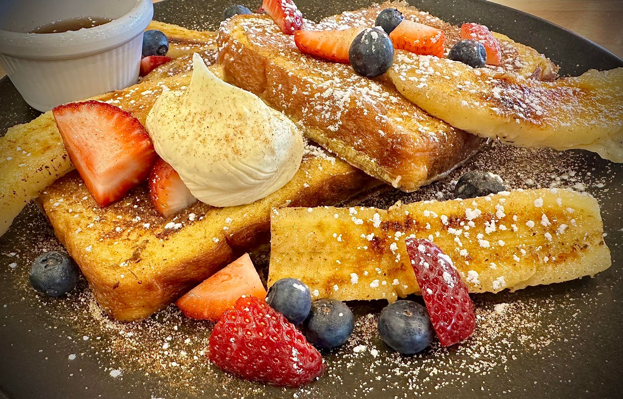 Afternoon tea - French toast with bananas, strawberries & blueberries.