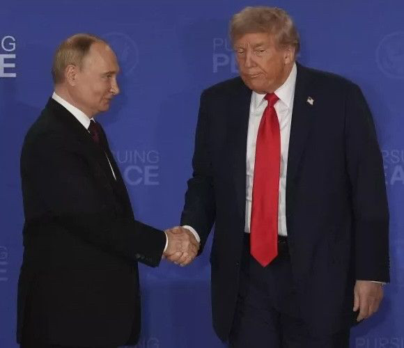 A smiling, composed Putin shakes the hand of a slump-shouldered, disheveled Trump.