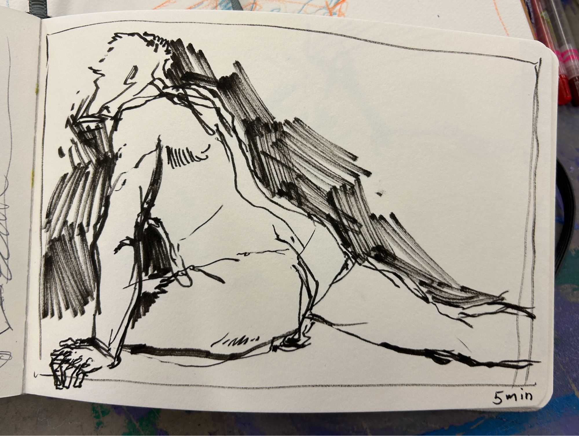 A black marker sketch of a man from behind, leaning forward and stretching his right leg back