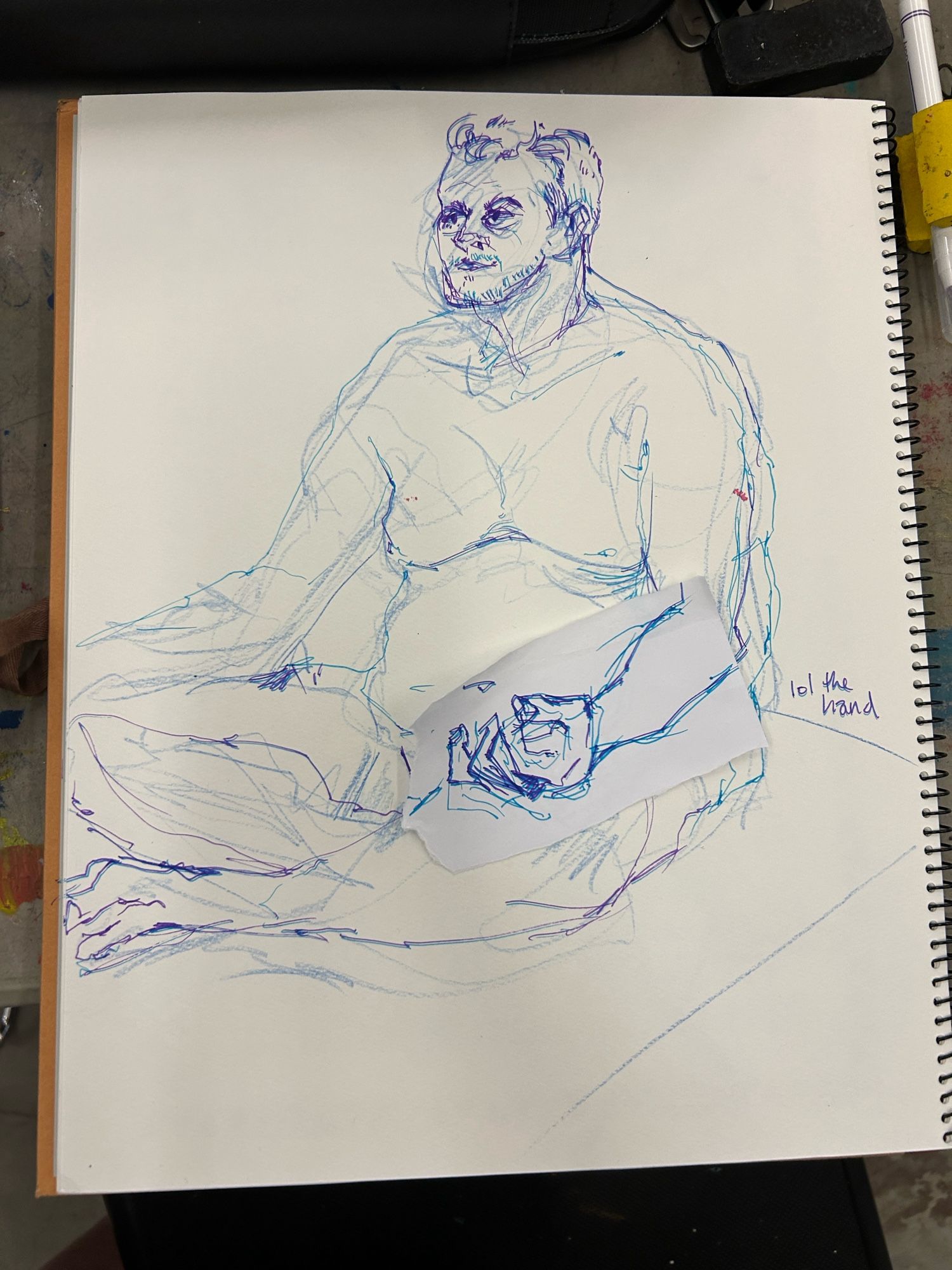 Sketch of a nude man sitting on the ground in purple/blue pen