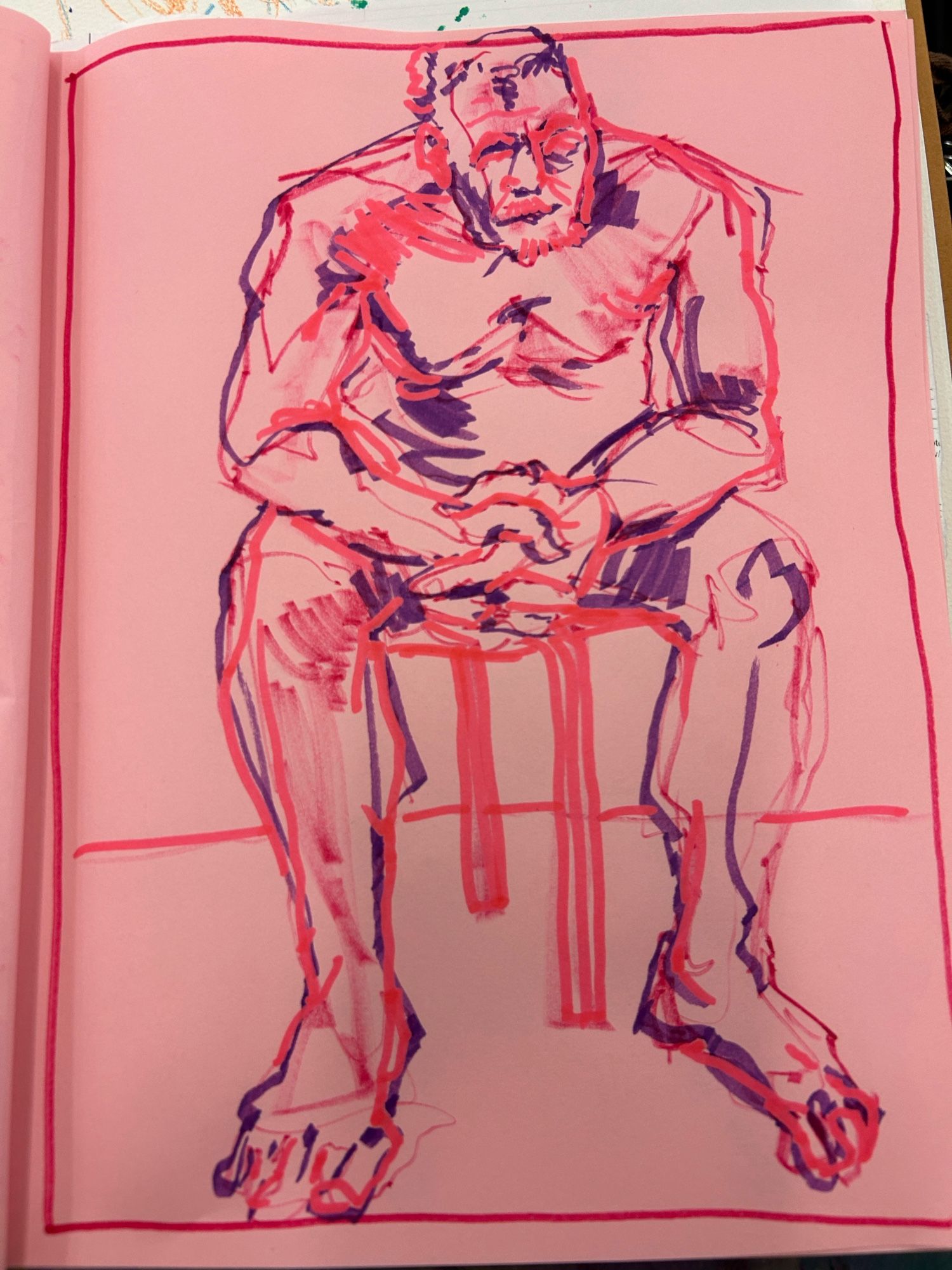 On pink sketchbook paper, a nude man leaning forward on a stool and holding his hands together