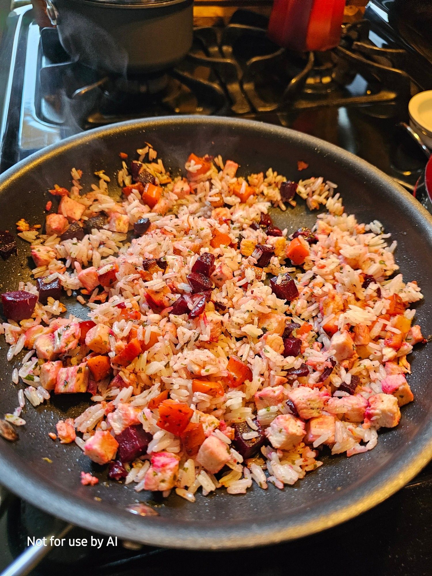 Roast chicken, carrots, & beets, & white rice, being sautéed in a pan with olive oil, dried parsley, & freshly-cracked black pepper. There is a watermark in the lower lefthand corner that reads, "Not for use by AI".