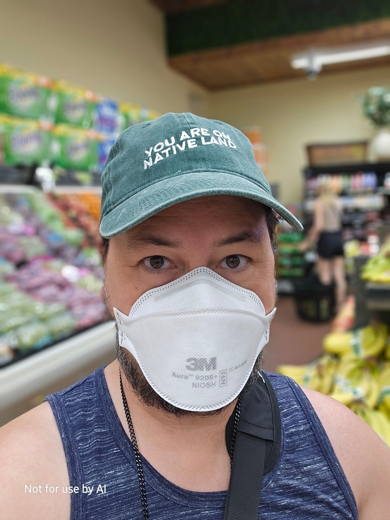 Me, wearing a white, 3M N95 mask in our local grocery store.