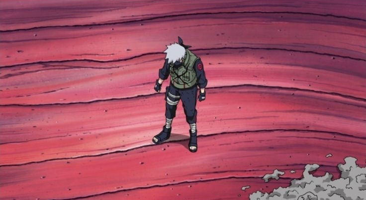 Kakashi, really small on the composition, clenching his fists and looking down in anger. Obito's ashes are just off to the side