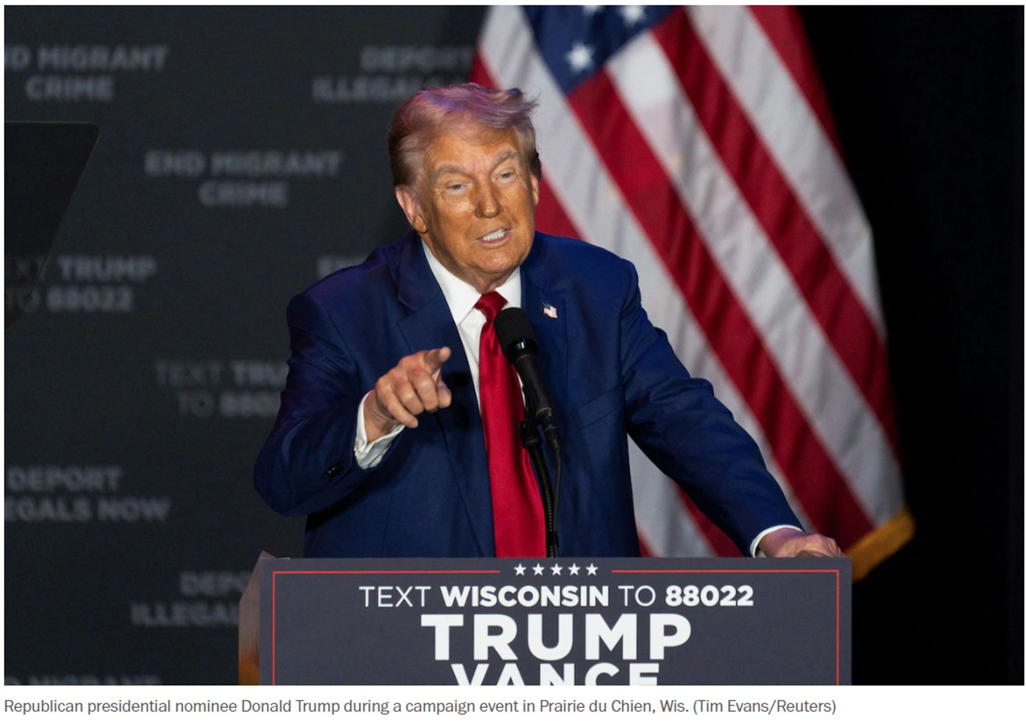 Photograph of Donald Trump, with his hair appearing purple due to the lighting.  From: https://www.washingtonpost.com/politics/2024/09/28/trump-harris-attacks-mentally-impaired-criticism/