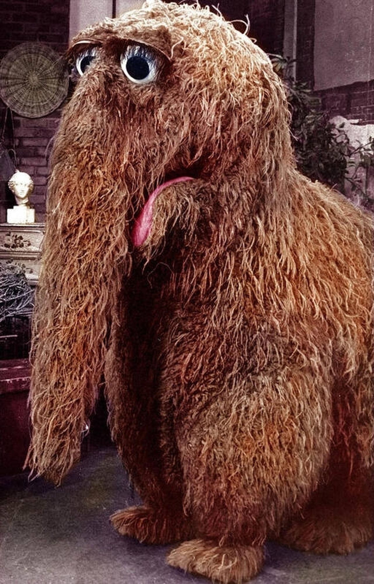 An image of the Muppet Snuffleupagus, a large elephant style critter with all brown fur (hair?) but lacking tusks