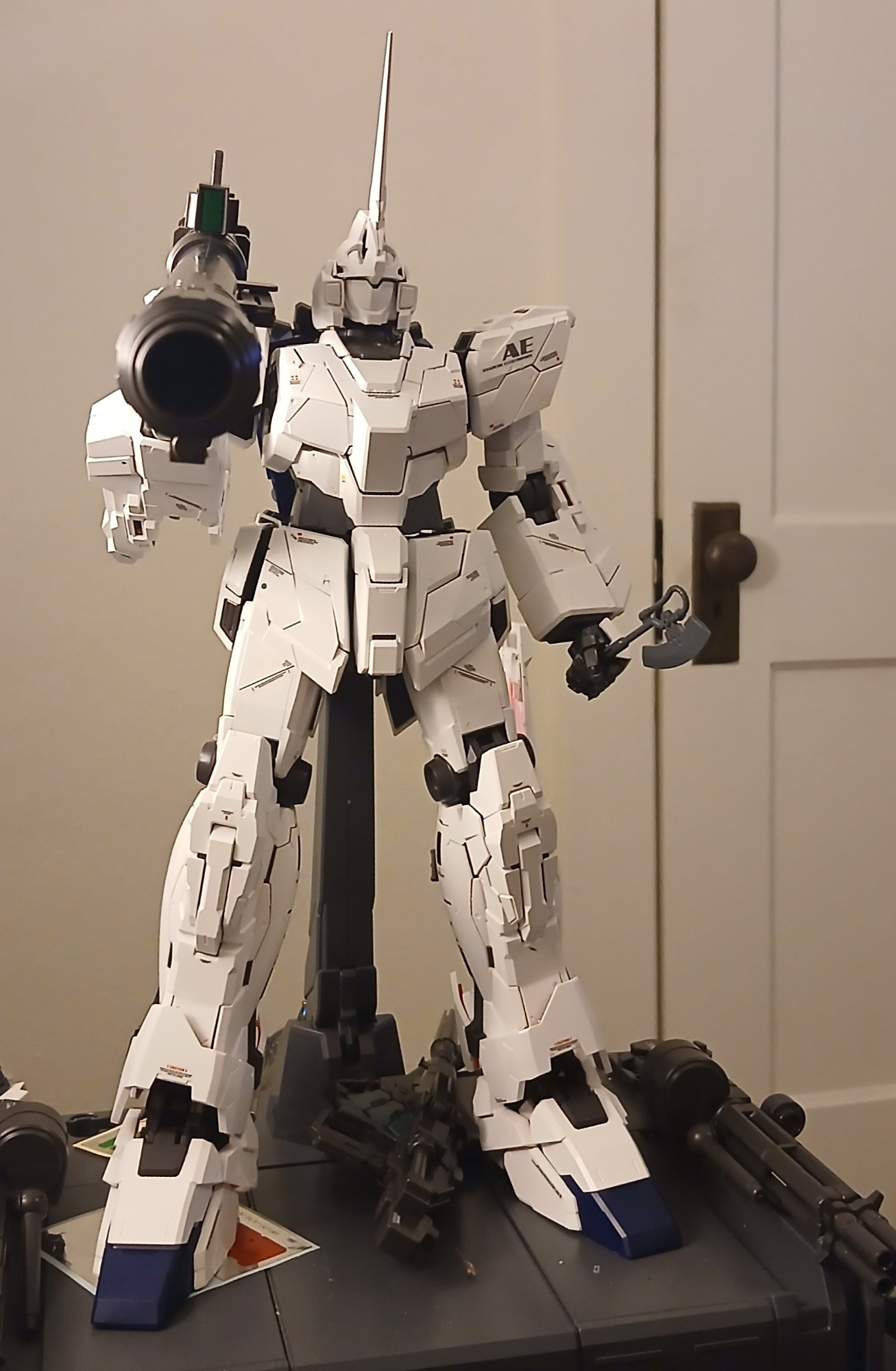 The Gundam Unicorn points a bazooka at you.