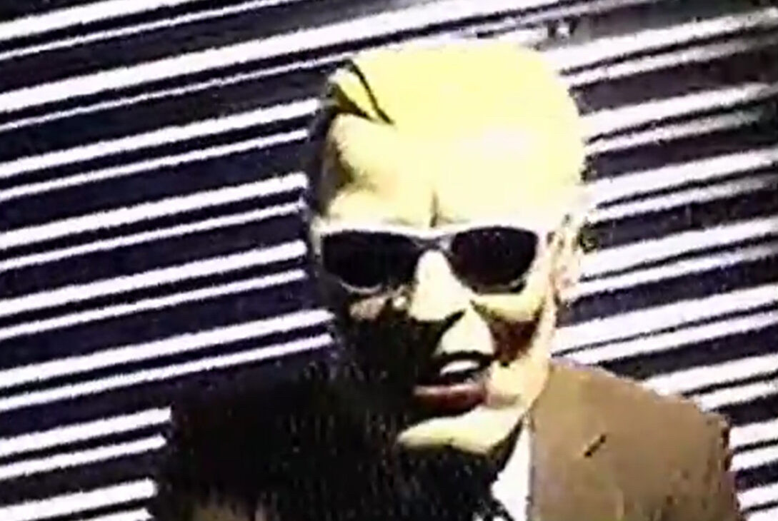 Person in Max Headroom mask from the max headroom incident