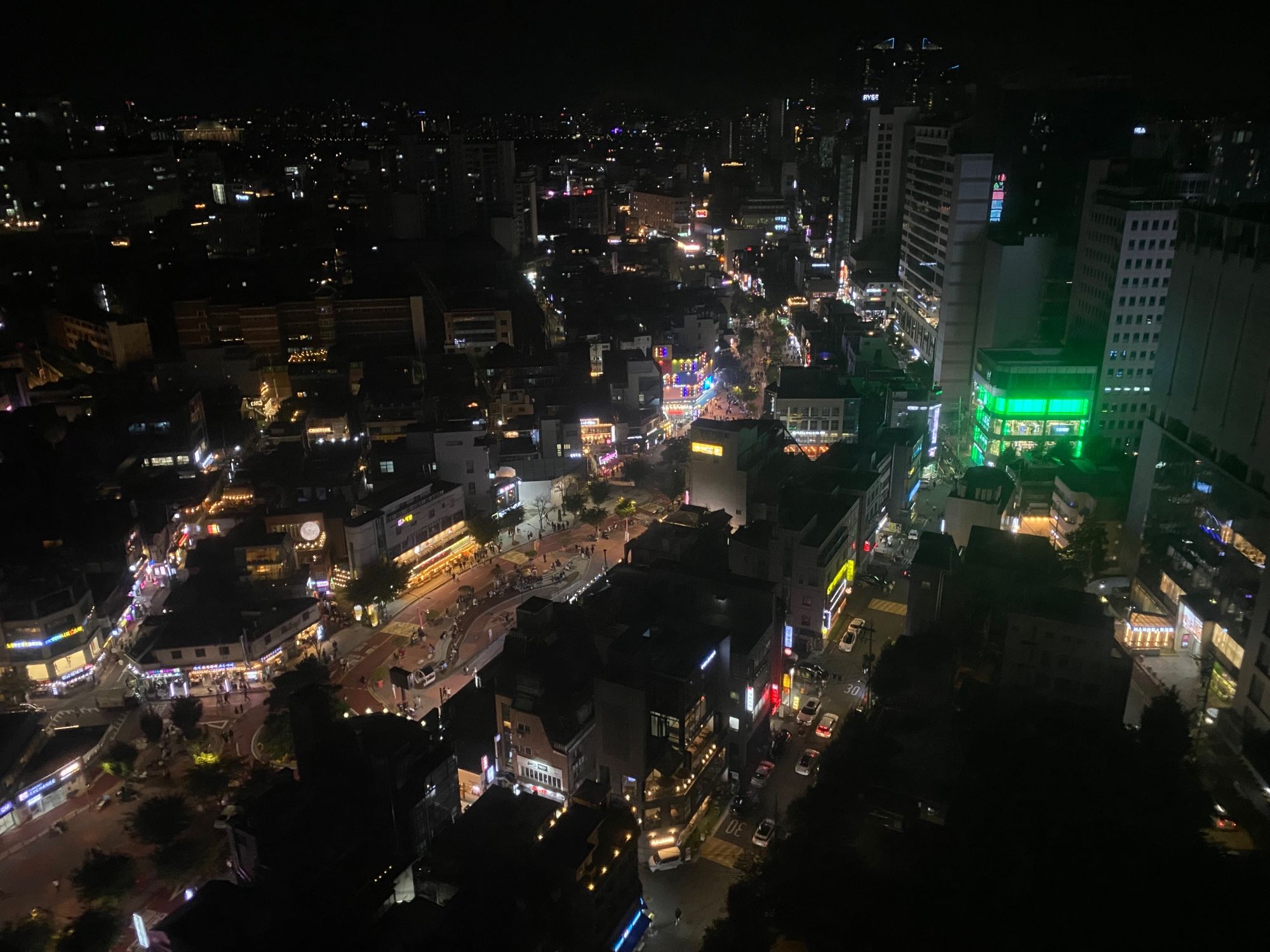 Aerial of Hongdae bar strip at night.