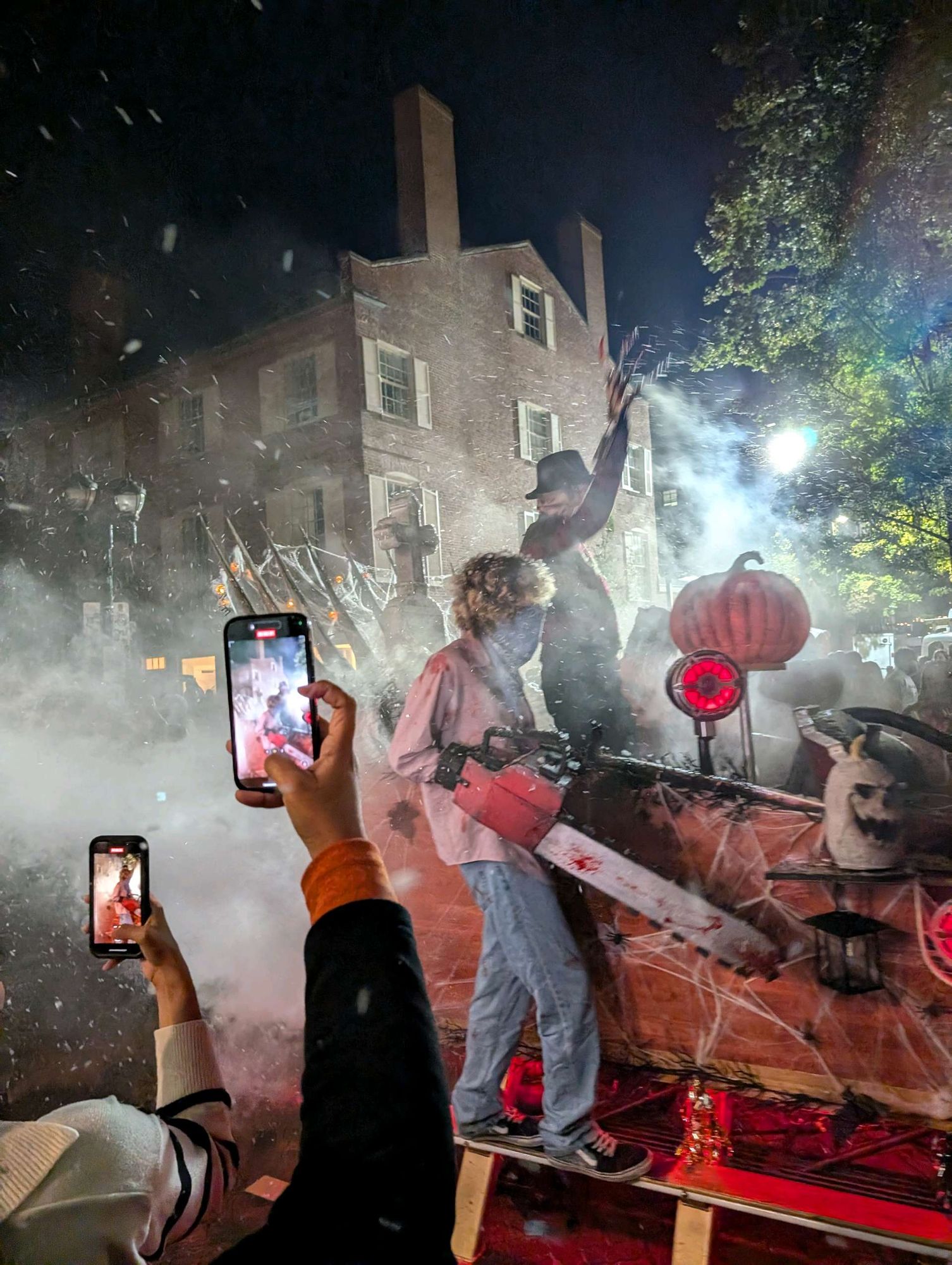 A float at night with pumpkins monsters and bubbles