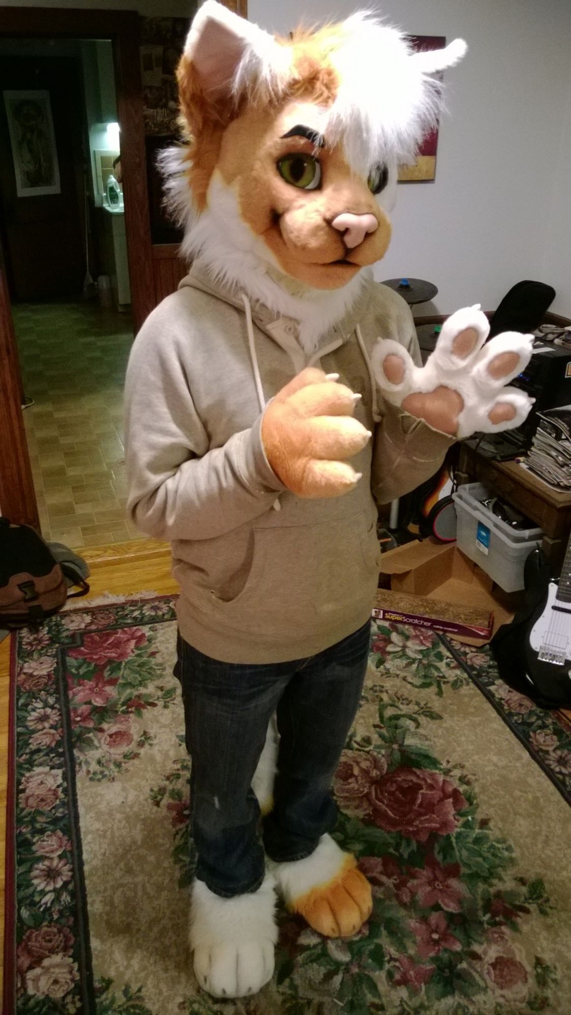 Photo of me wearing my Smudge partial fursuit for the first time, October 21, 2013!  Taken in the living room of the apartment we would eventually live in for almost a decade prior to buying the place we live in now.