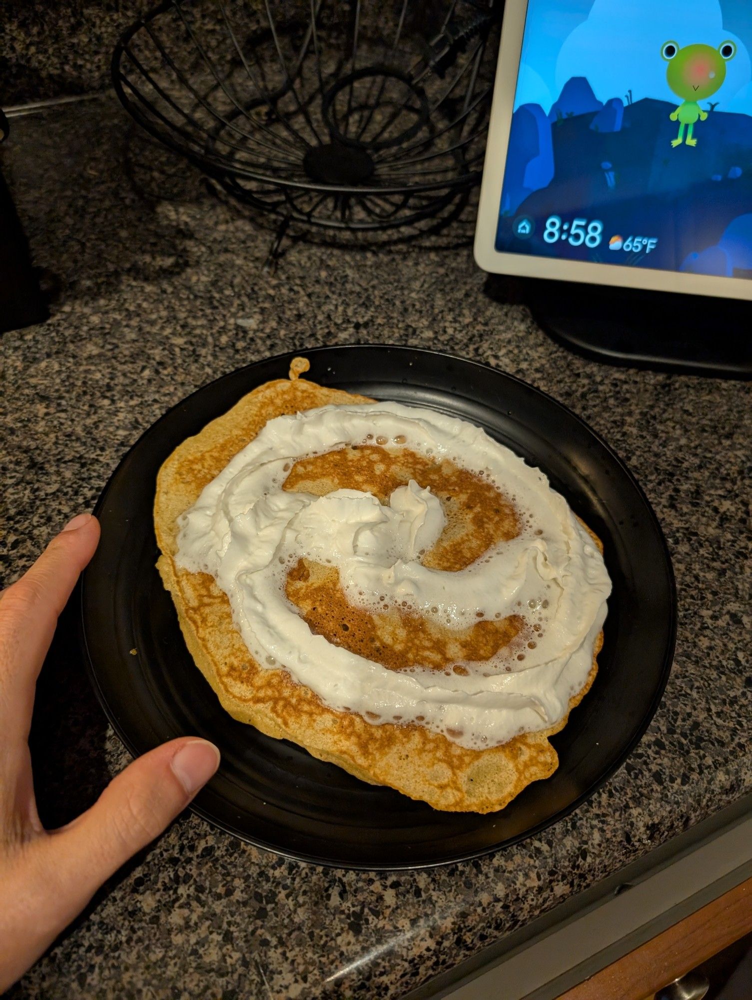 Cassava flour pancake taking up almost all of a ten inch plate