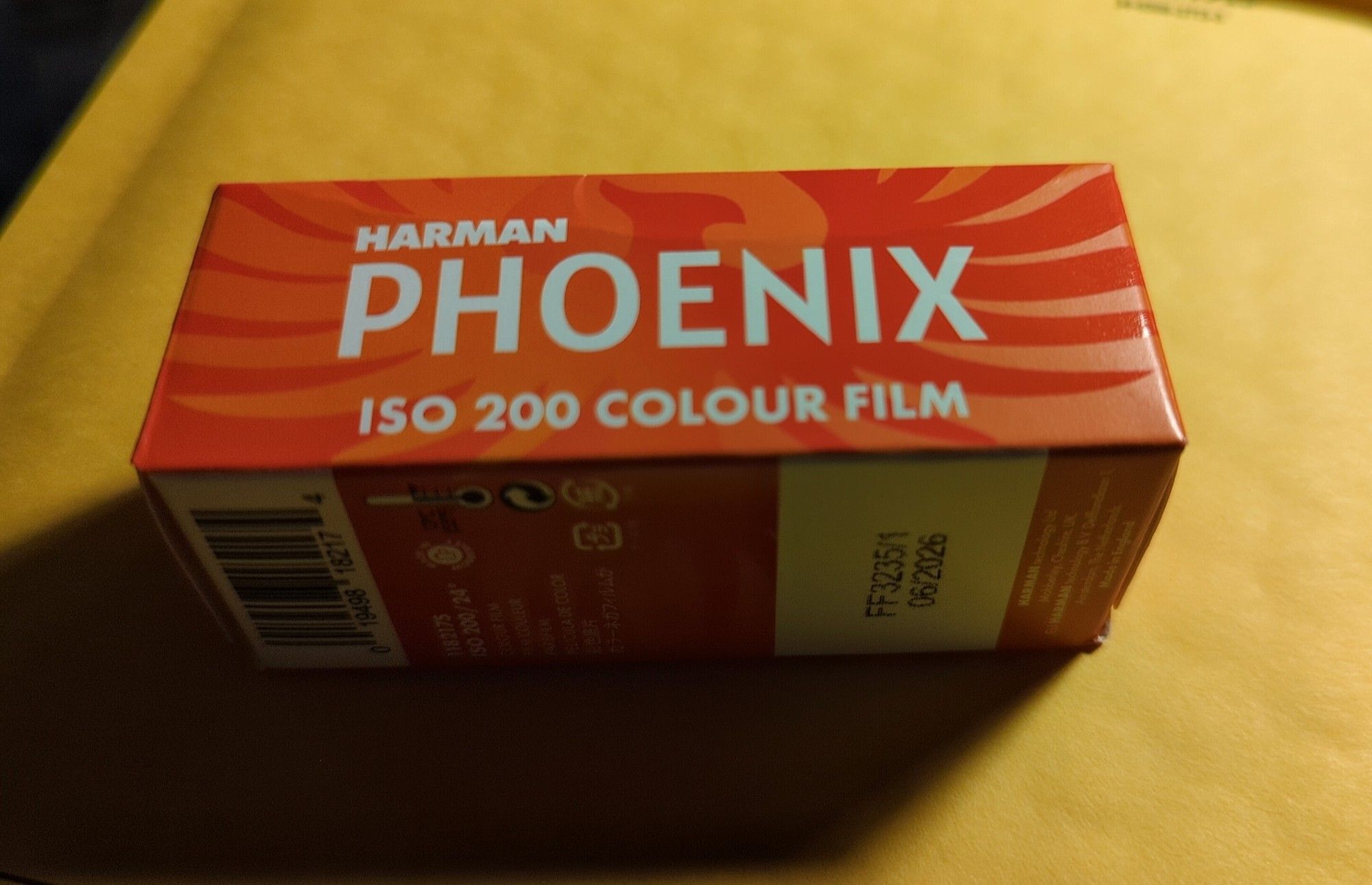 A single 120 roll of Harman Phoenix ISO 200 Colour Film in its unopened box.