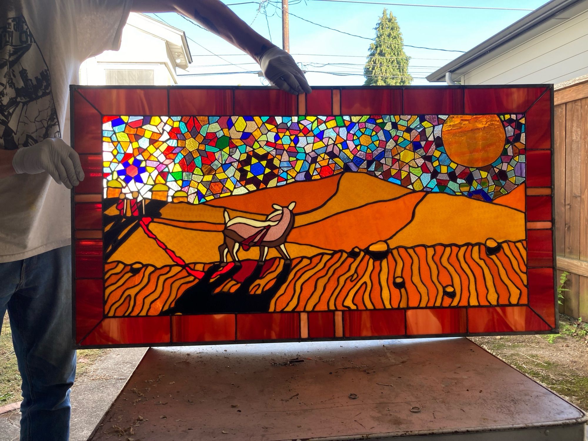 Goat in desert stained glass