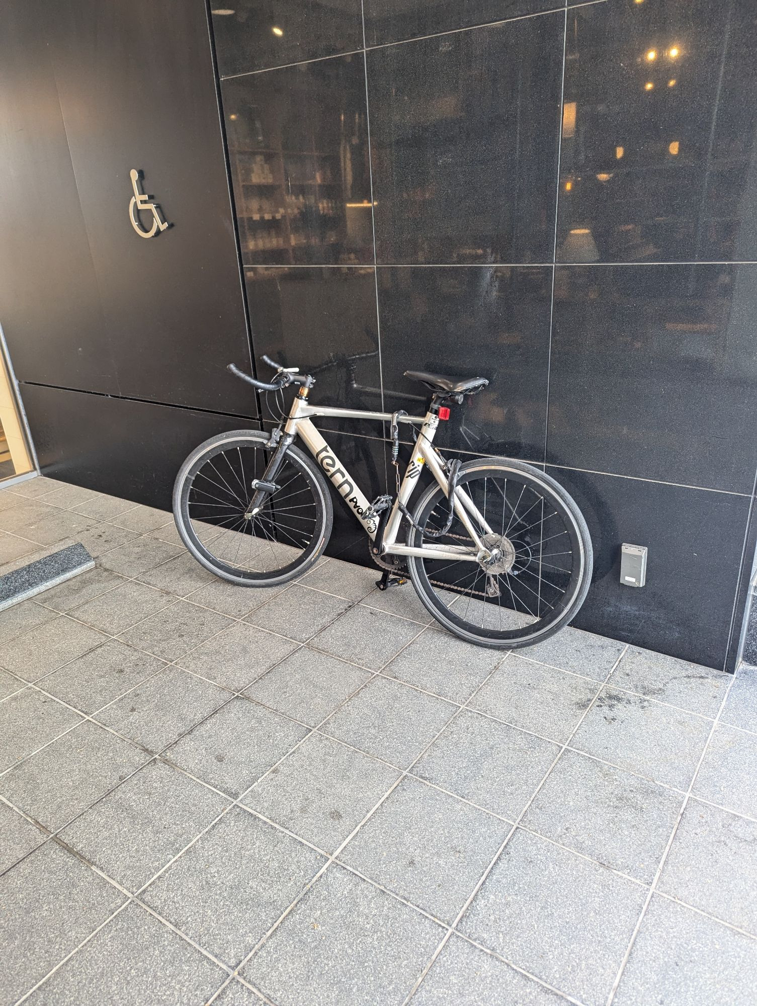 An aero aluminum Tern frame road bike with bullhorn bars. Strange because I only knew Tern for their e-bikes.