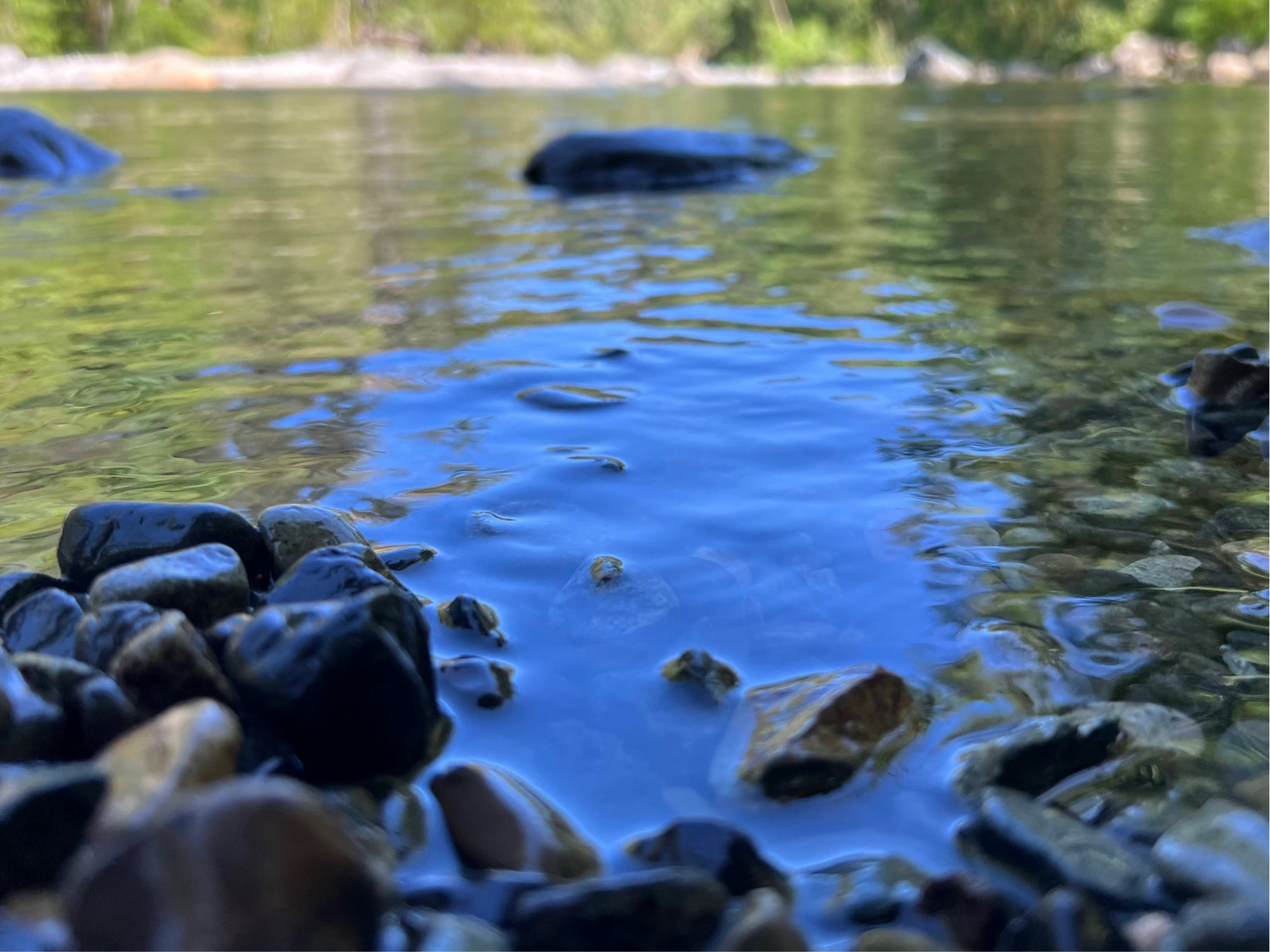 A low shot of stones in a river