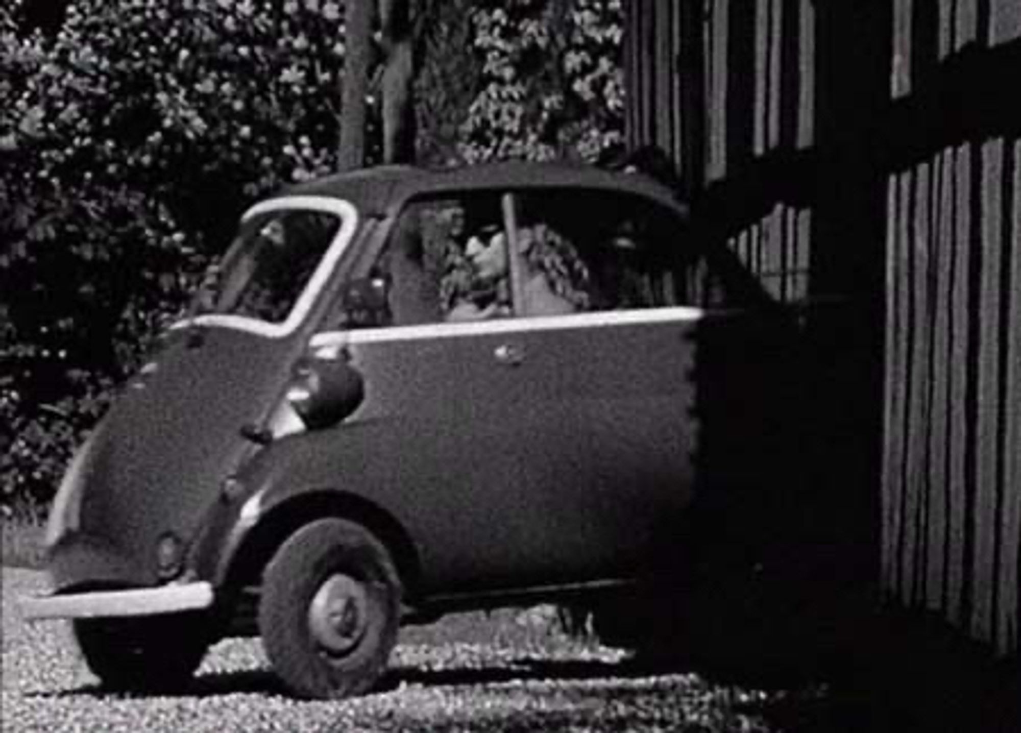 Dave Gahan from Depeche Mode driving in a tiny '57 BMW Isetta