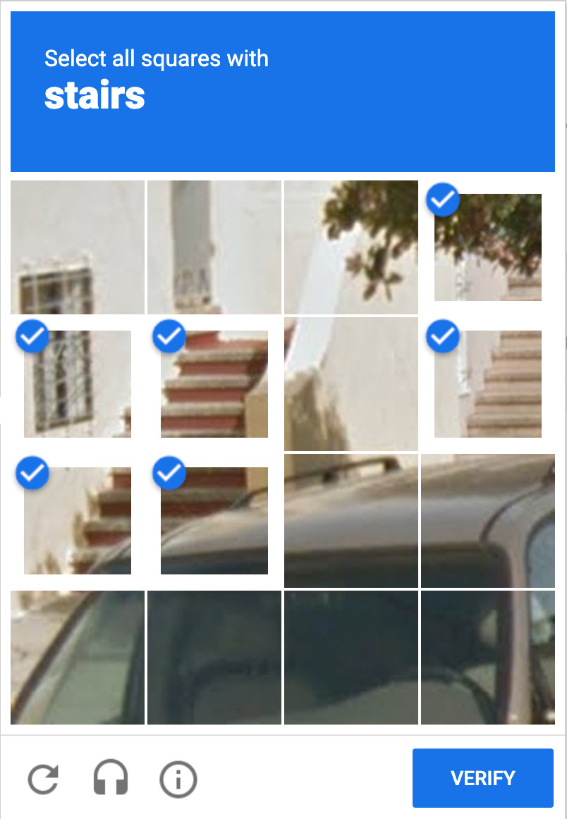 a CAPTCHA dialog box asking a user to identify all the squares that contain stairs