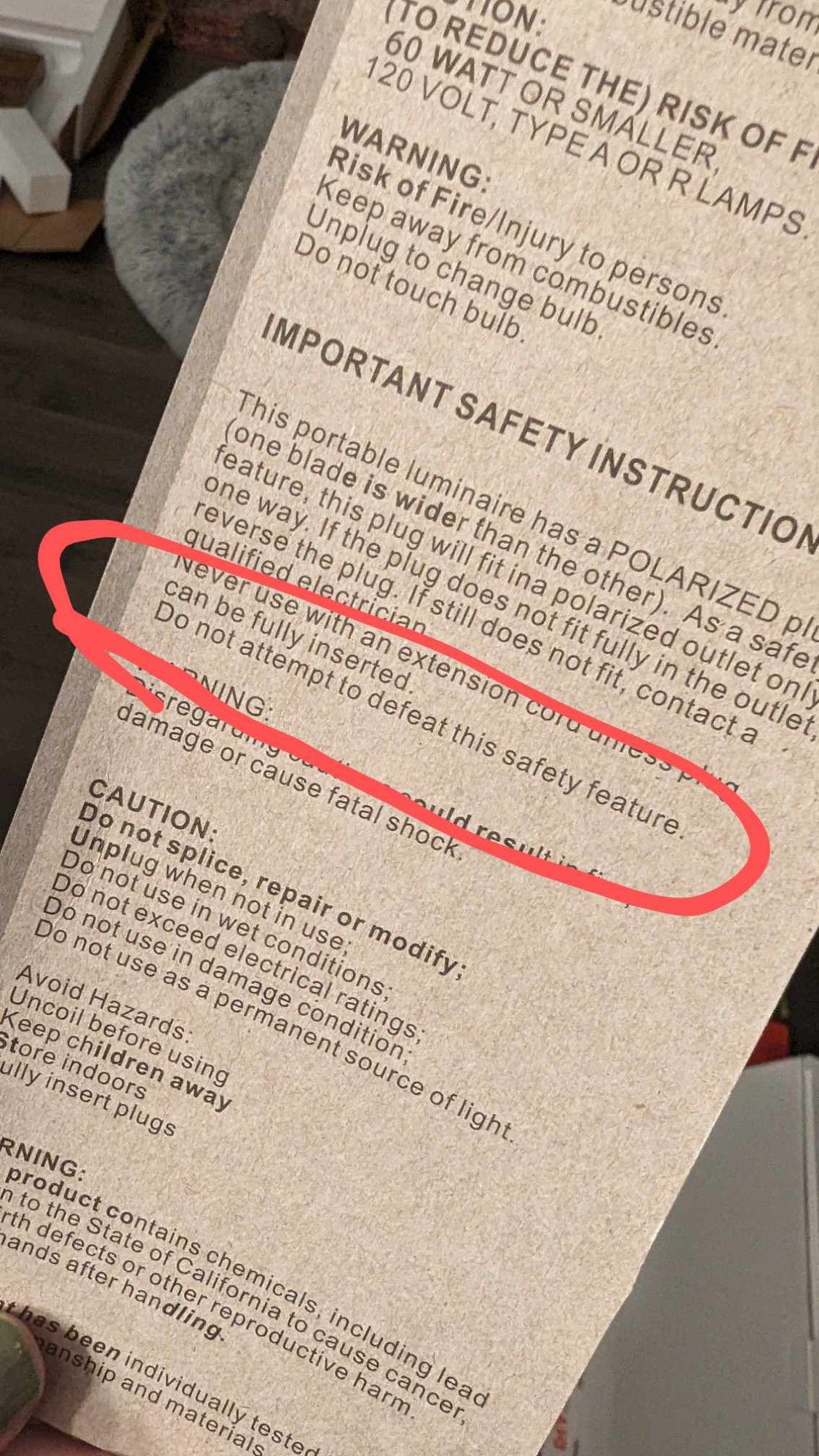 A document is headed "Important Safety Instructions." Among other text, encircled in red is the phrase "Do not attempt to defeat this safety feature."