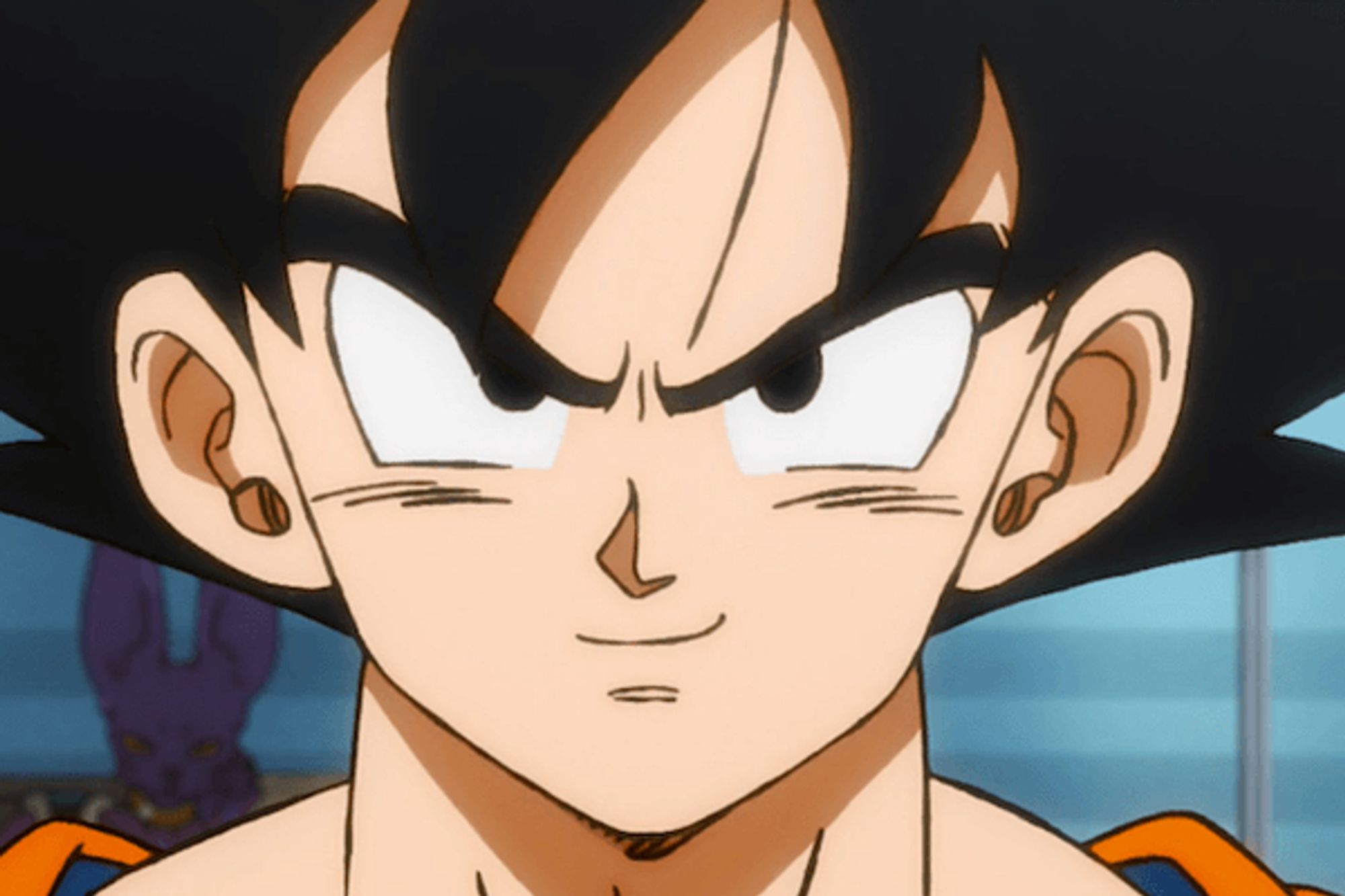 A picture of Goku, from Dragon Ball Z, grinning.