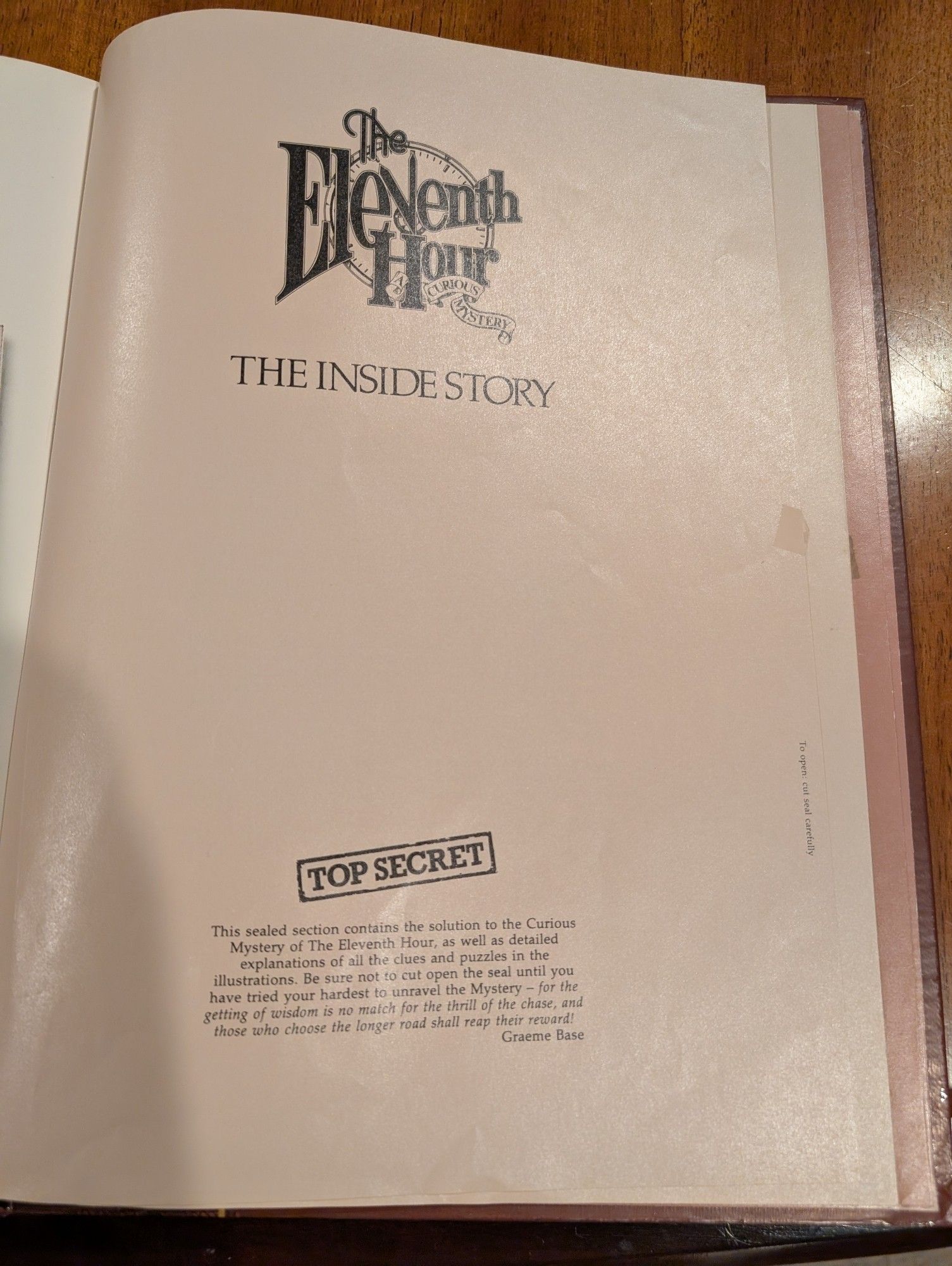 In the back of The Eleventh Hour, there was a sealed section of pages. It was called "The inside story," and had all the answers to the riddles and puzzles.