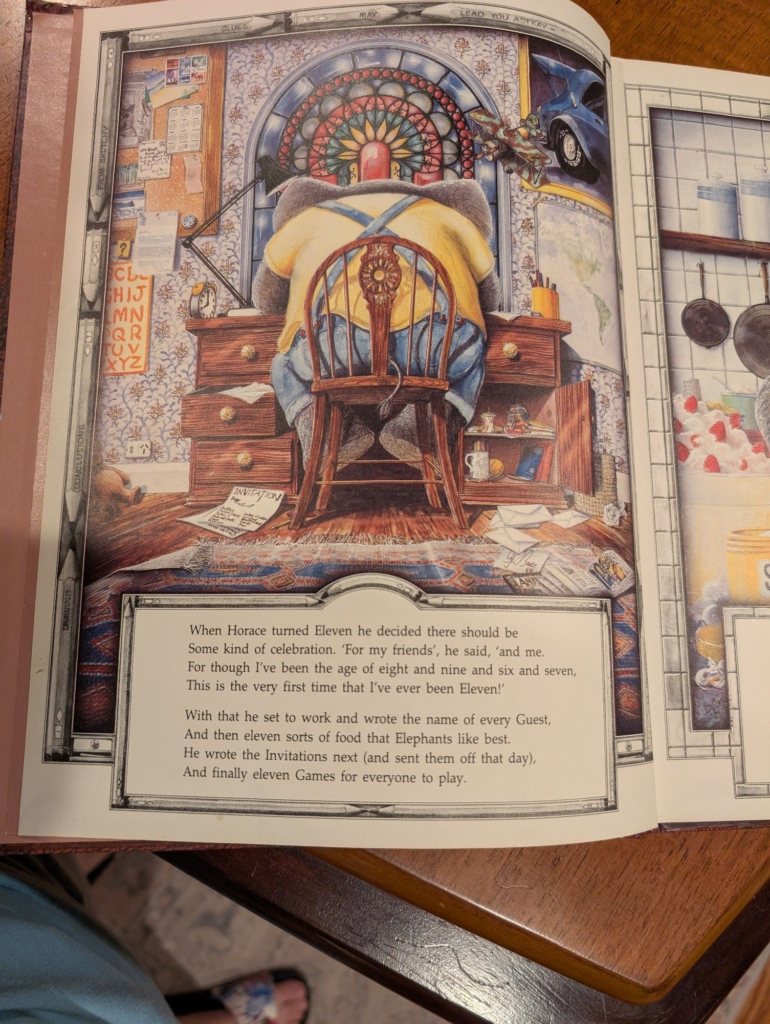 The first page of The Eleventh Hour features an elephant sitting at a desk, facing away from us. He's wearing a yellow shirt and blue pants and his desk and office are messy. There's the main text at the bottom and then text and codes around the border of the page.