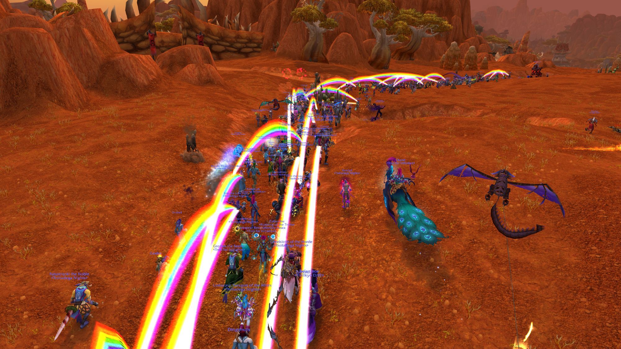 A mass of rainbows connecting trolls together as they run through Durotar