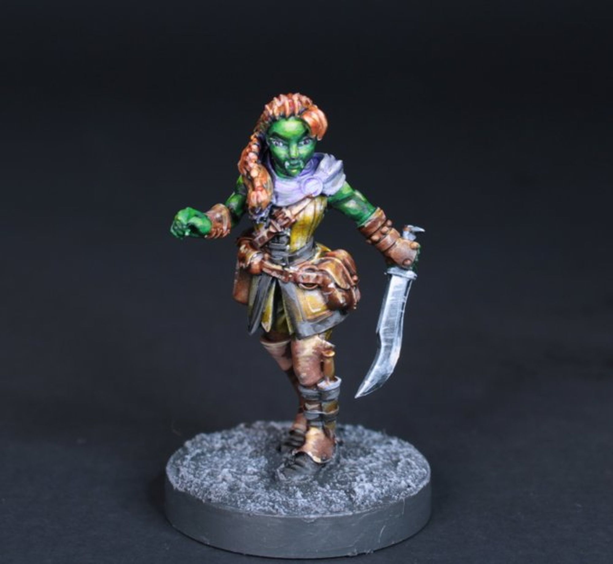 A half orc rogue miniature.