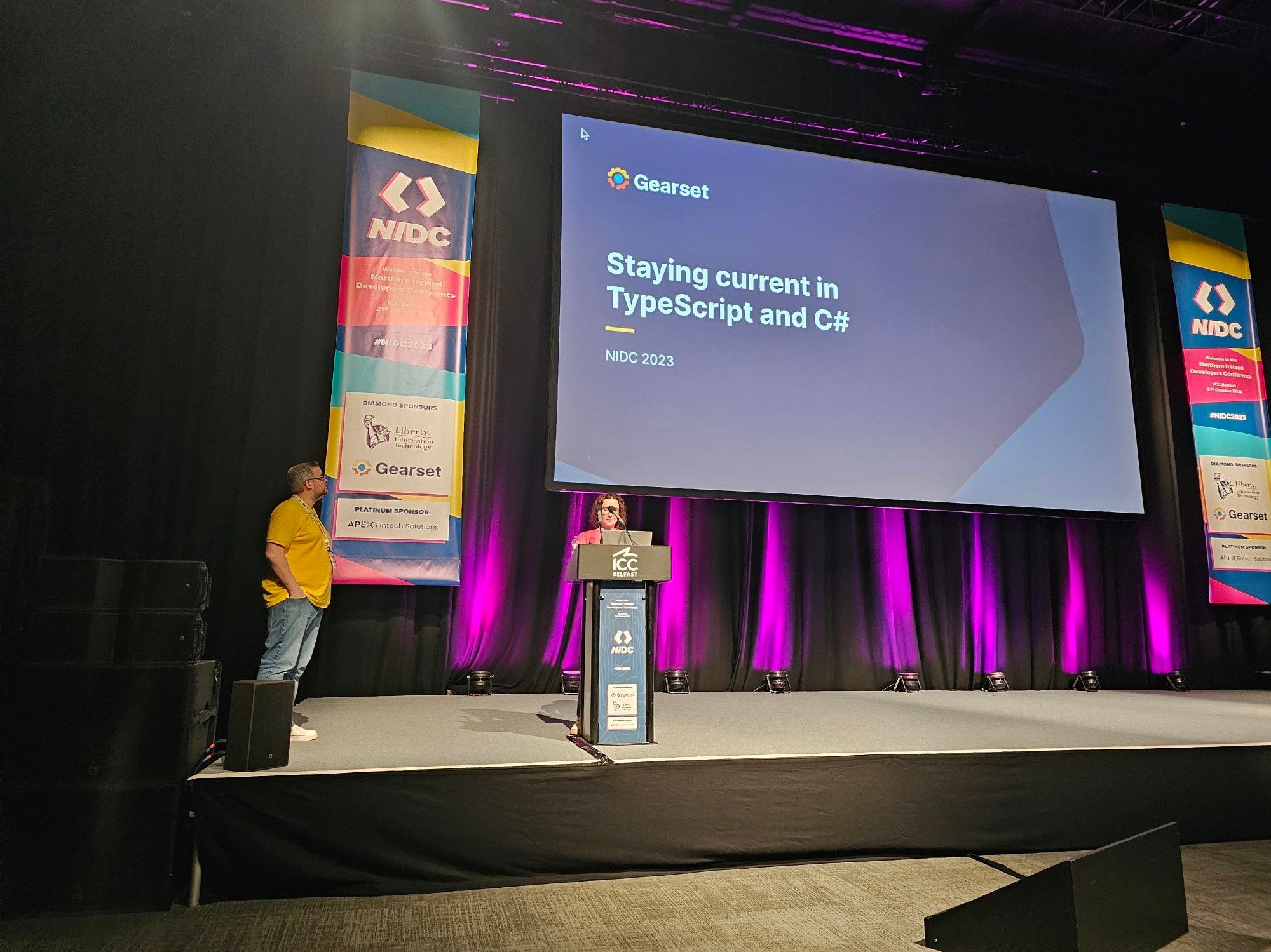 A speaker presenting on Typescript and C#