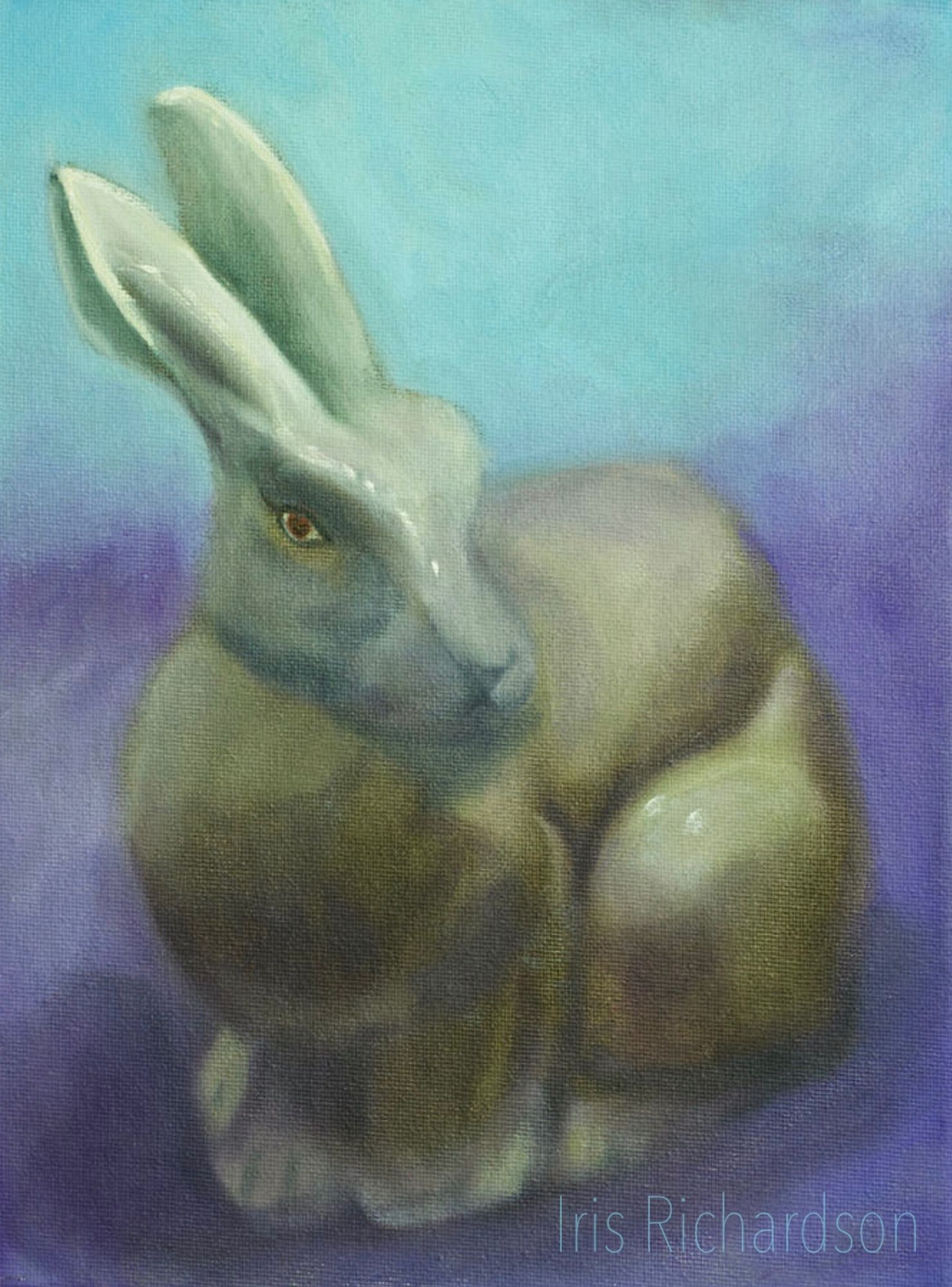 Bunny on blue and purple, painting in oil on canvas. The bunny is sitting quietly looking out at the viewer. Its prominent bunny ears lead the eye to its elegant elongated face. The bunny rabbit symbolizes good fortune, wealth, and procreation. It also has become the symbol of rebirth and renewal. A beacon of hope. Artist Iris Richardson, Gallery Pixel