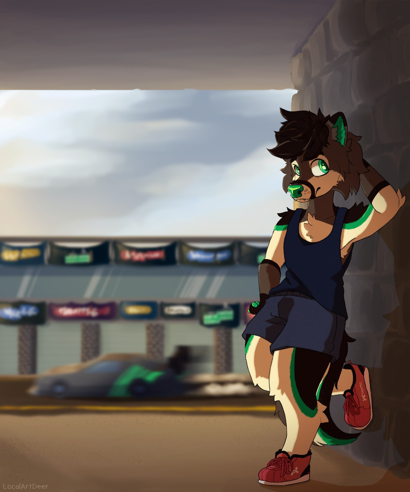 Digital art of a brown and green canine anthropomorphic character. He is wearing a blue singlet, faded blue-grey shorts and red sneakers while leaning against a brick wall. In the background is part of a racetrack, with sponsor flags, garage entrances and a car speeding past.