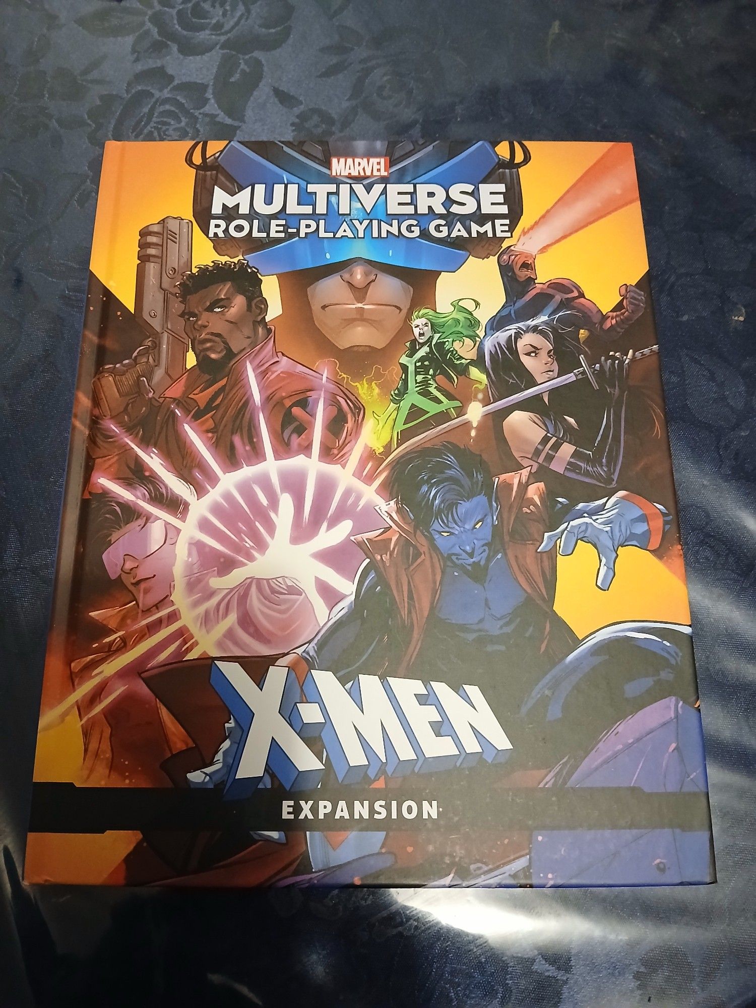 Couverture du supplément "X-Men" pour le jeu de rôle "Marvel Multiverse"