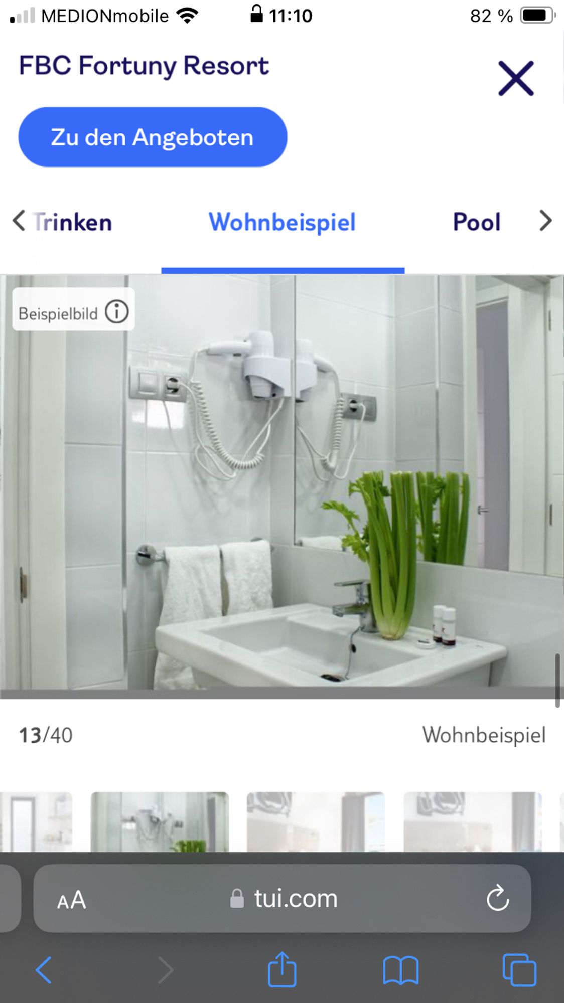 Foto eines Hotelbadezimmers auf TUI.com. Auf dem Waschbecken steht ein Sellerie.