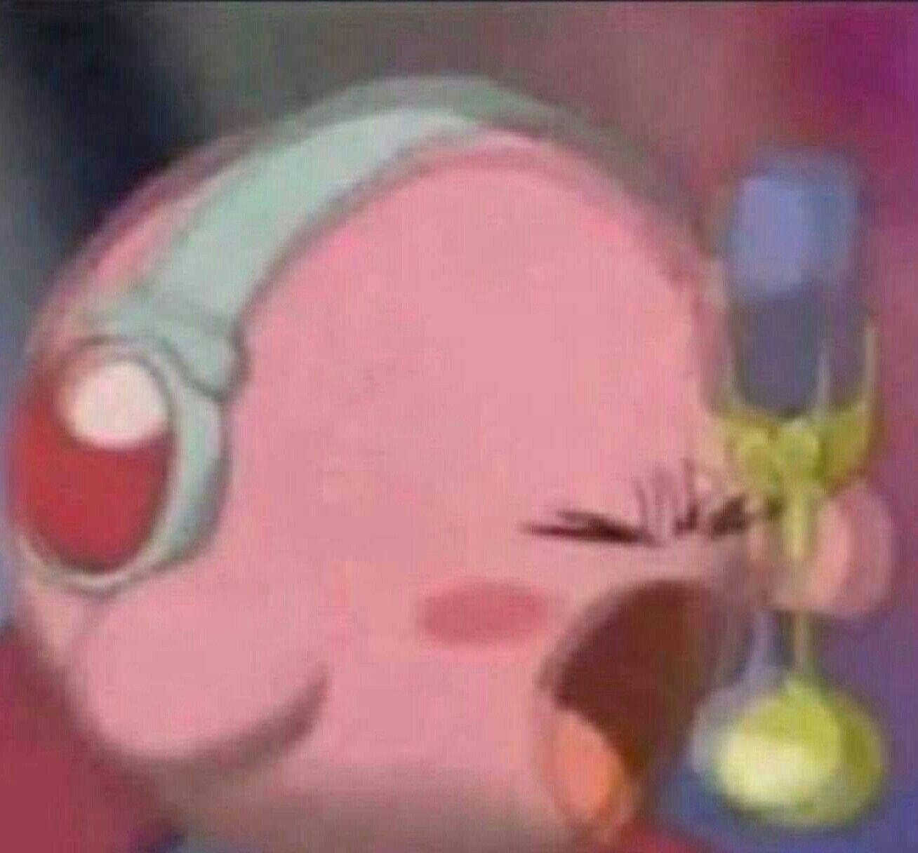 Kirby screaming into a microphone 