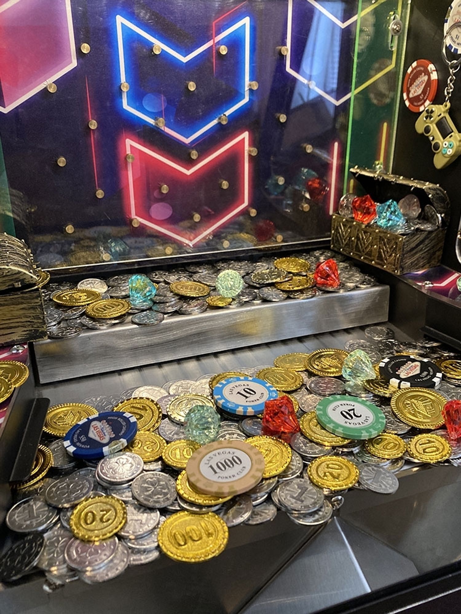 One of those damnable coin pusher machines where it always looks like the coins are going to drop but never do