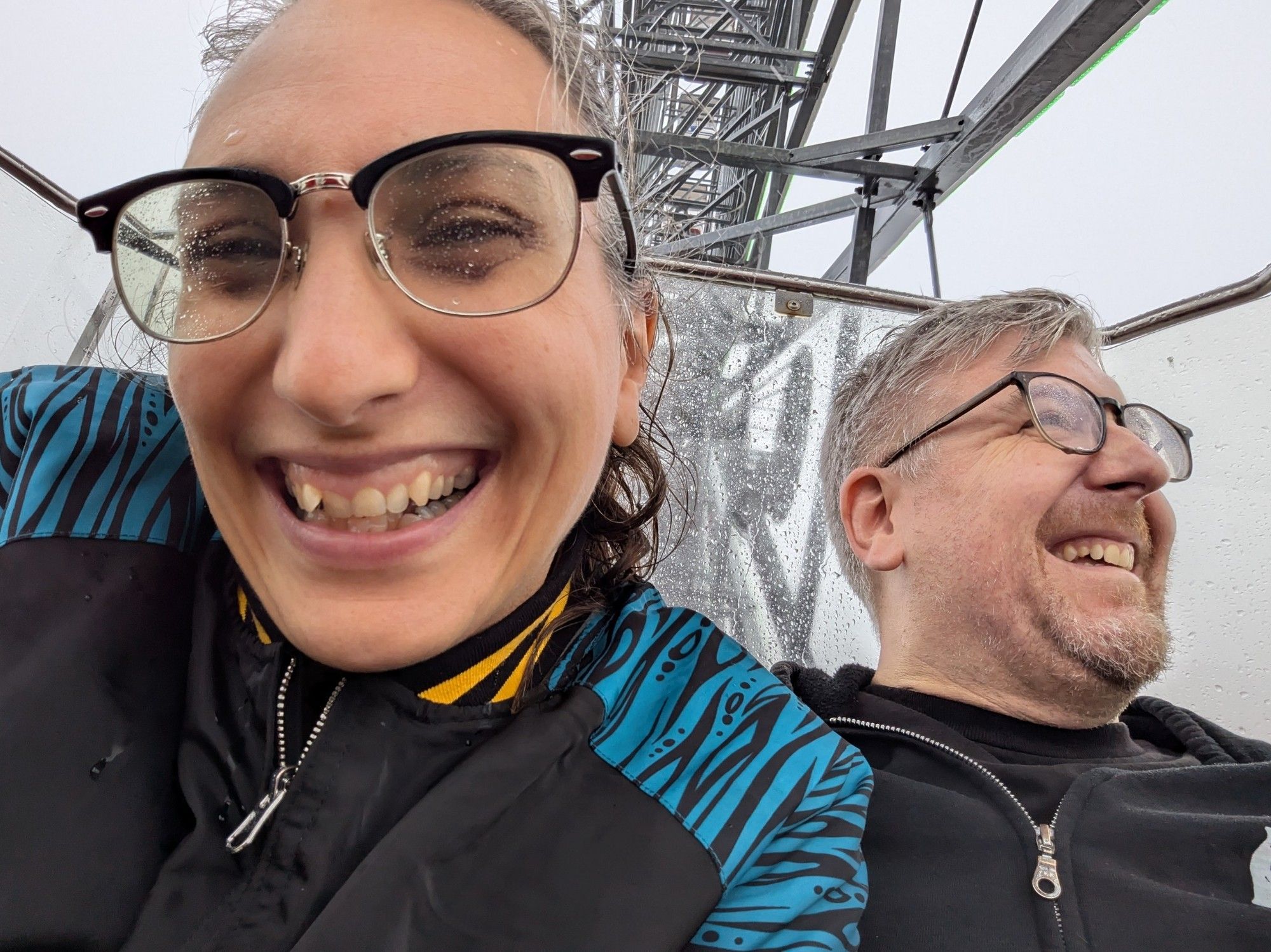 Marissa and Paul in a Ferris wheel in inclement weather