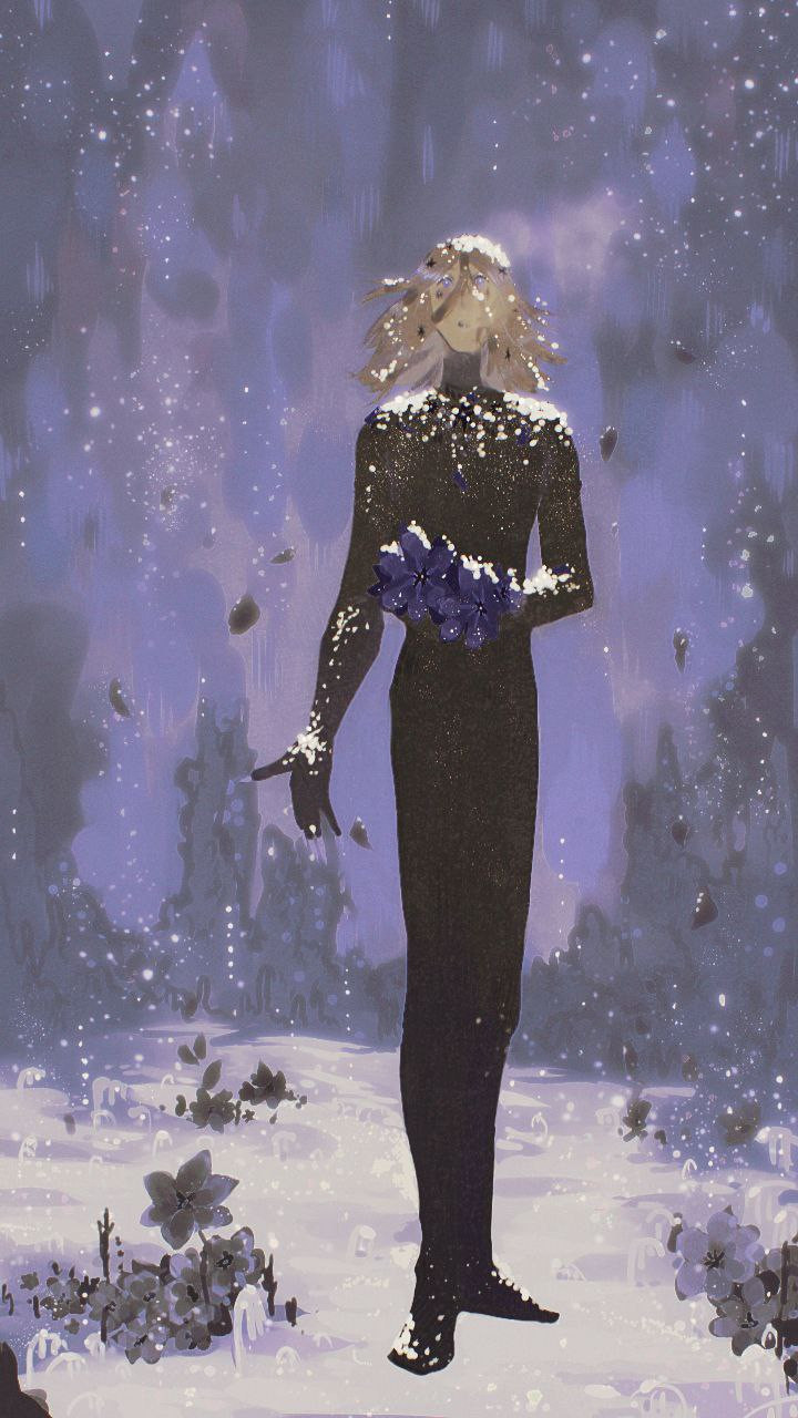 A young man stands full height against a purple snowy theatre backdrop. The snow is falling. The young man is dressed from toe to neck in a black tight-fitting suit. There is snow on his clothes. In one hand he holds three blue flowers. His face is surprised, looking up. There is steam coming out of his mouth. Snow and blue flowers in the background.