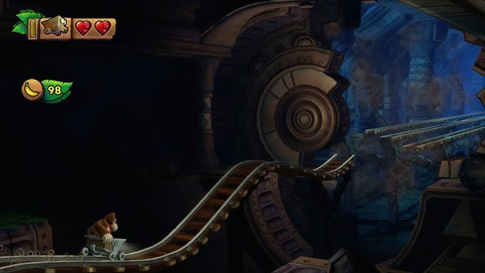 Screenshot of High Tide Ride, showing Donkey Kong riding a minecart into a beautiful aquarium-like ancient corridor with glass windows showing the ocean floor.