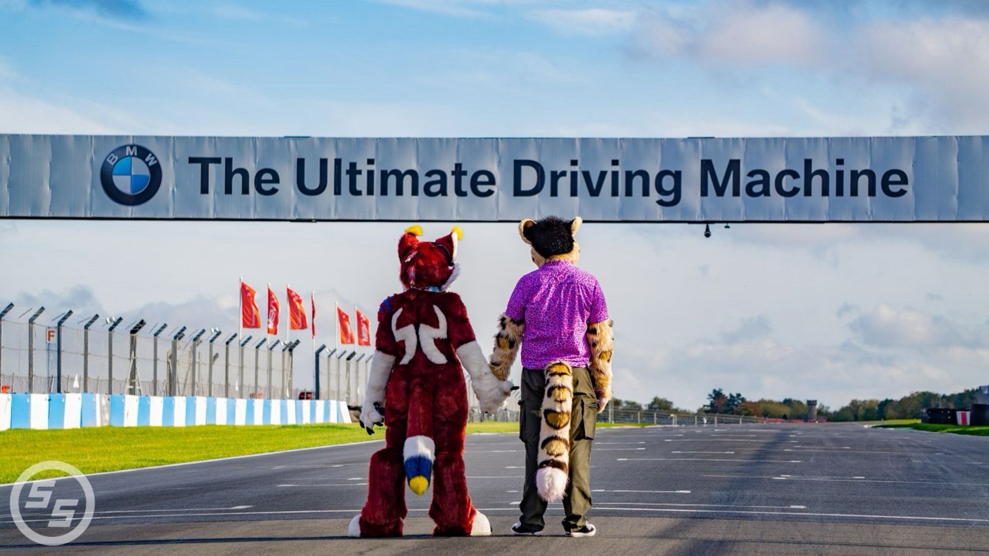 Hand in hand at Donington after a track day. We met through our love of cars and been together almost 5 years.