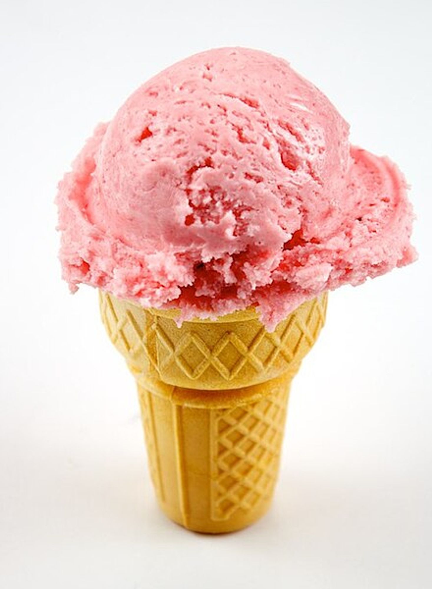 an ice cream cone with what looks like strawberry ice cream