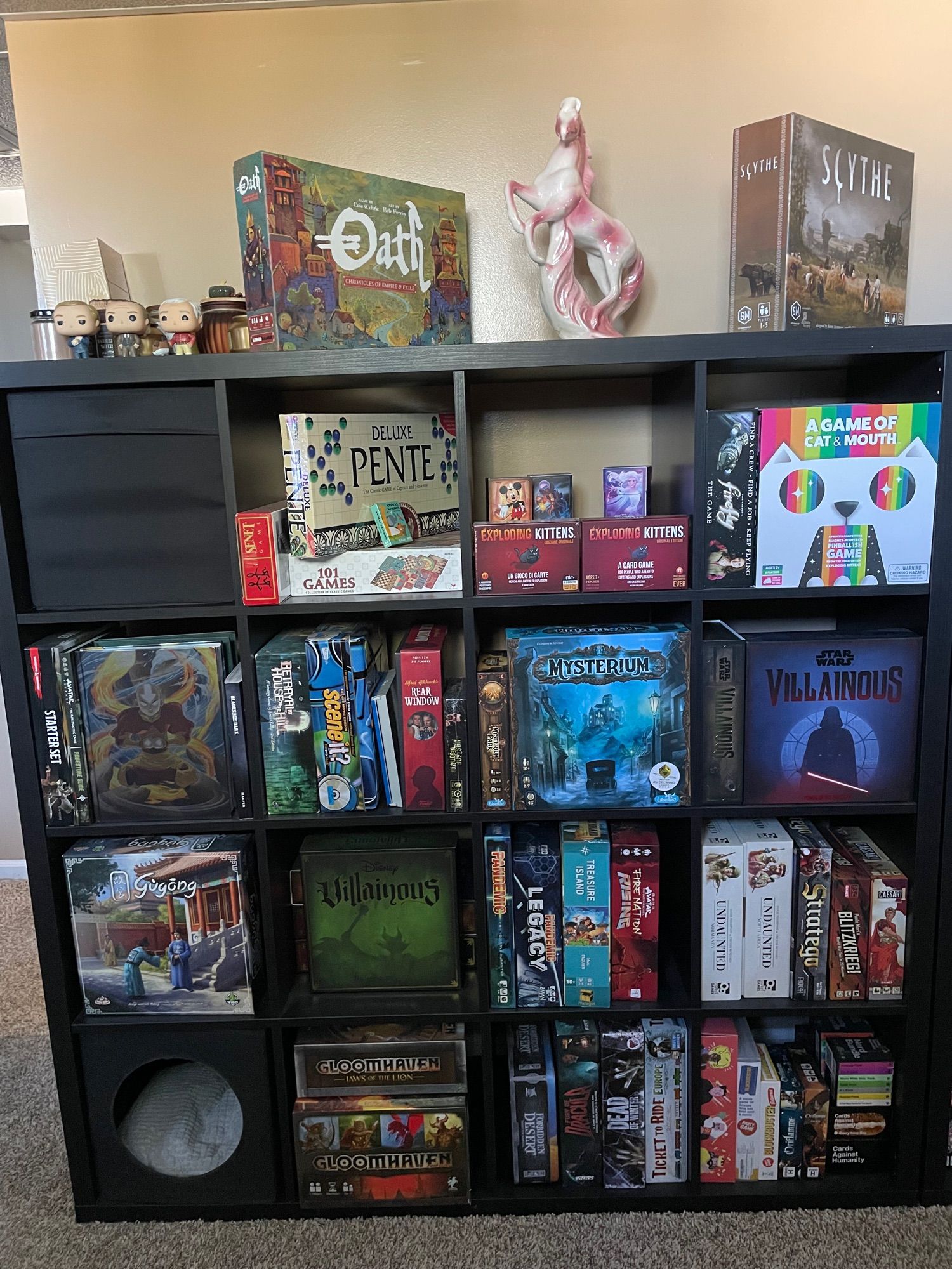 some of my board game collection. it includes Oath, Scythe, Gugong, Betrayal at House on the Hill, Mysterium, Undaunted, Dead of Winter, Monikers, a Game of Cat and Mouth, and many more