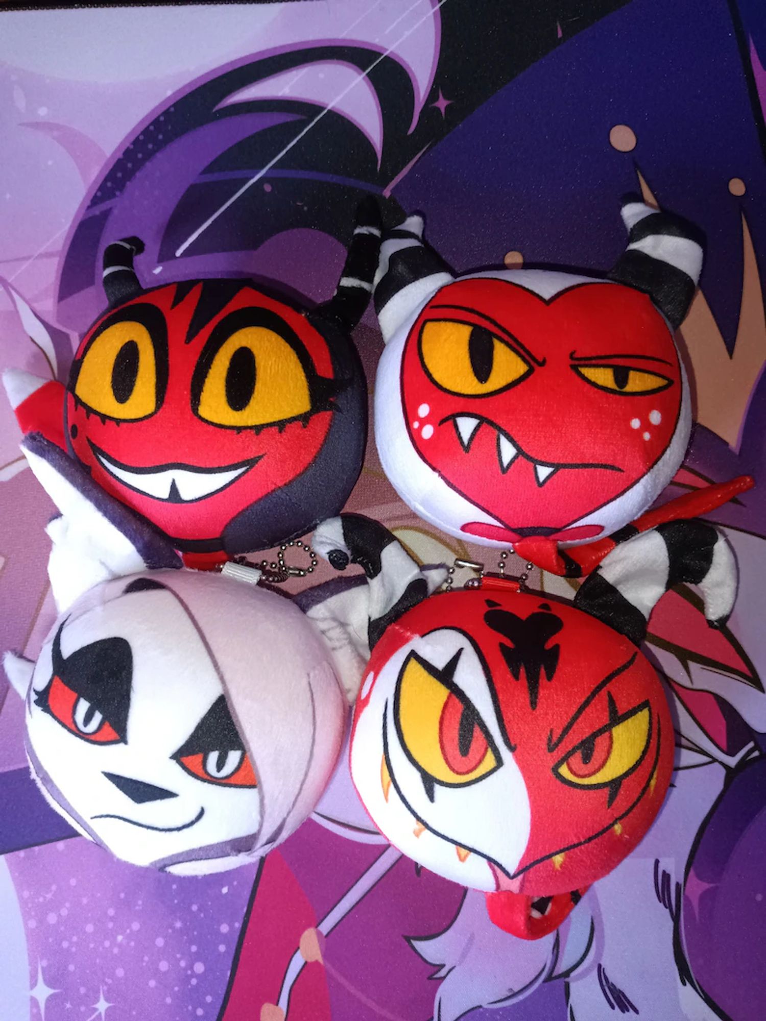 Round plush featuring Millie, Moxxie, Loona and Blitzo from Helluva Boss